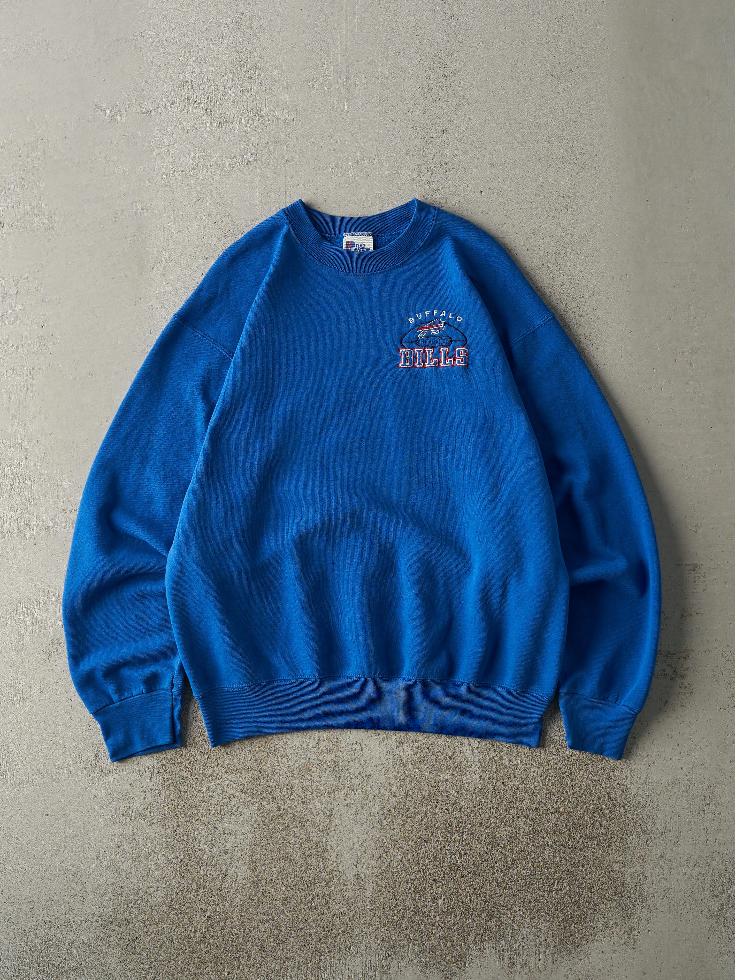 Vintage 90s Blue Buffalo Bills Embroidered Crewneck (M/L) sold by Rebalance Vintage
