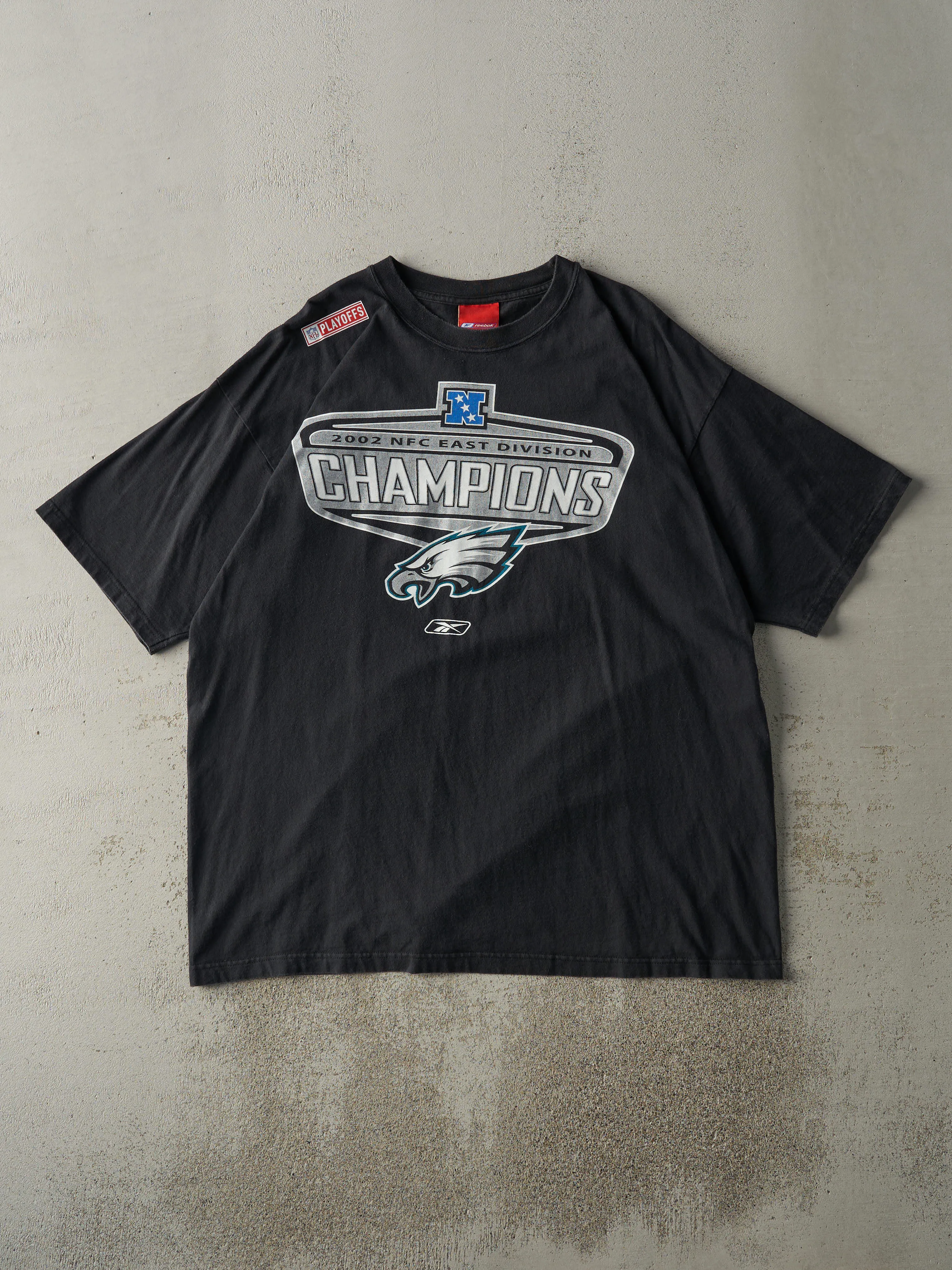 Vintage 02' Black Philadelphia Eagles NFC East Division Champs Tee (L/XL) sold by Rebalance Vintage