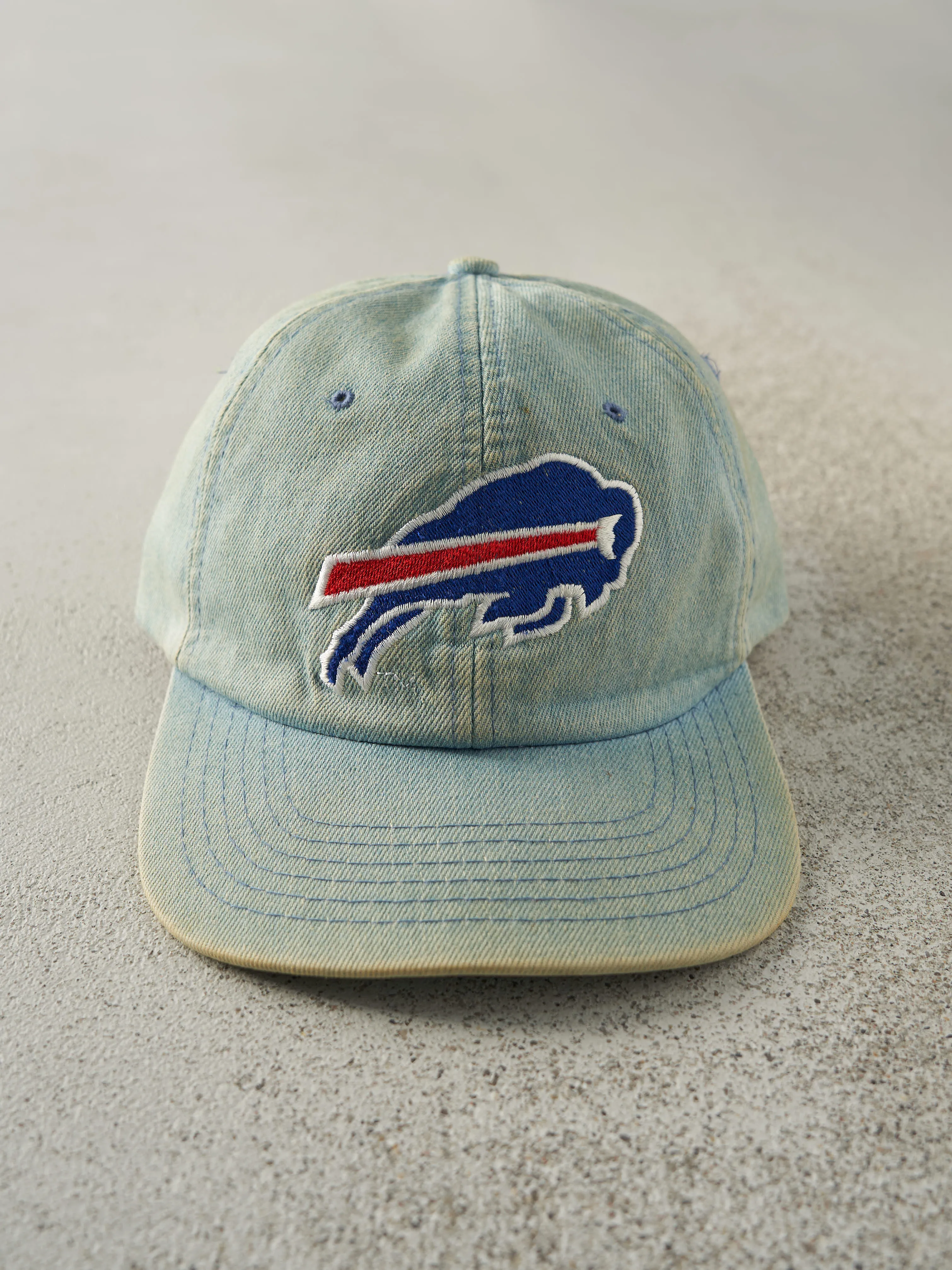 Vintage 90s Light Wash Denim Buffalo Bills Strap Back Hat sold by Rebalance Vintage