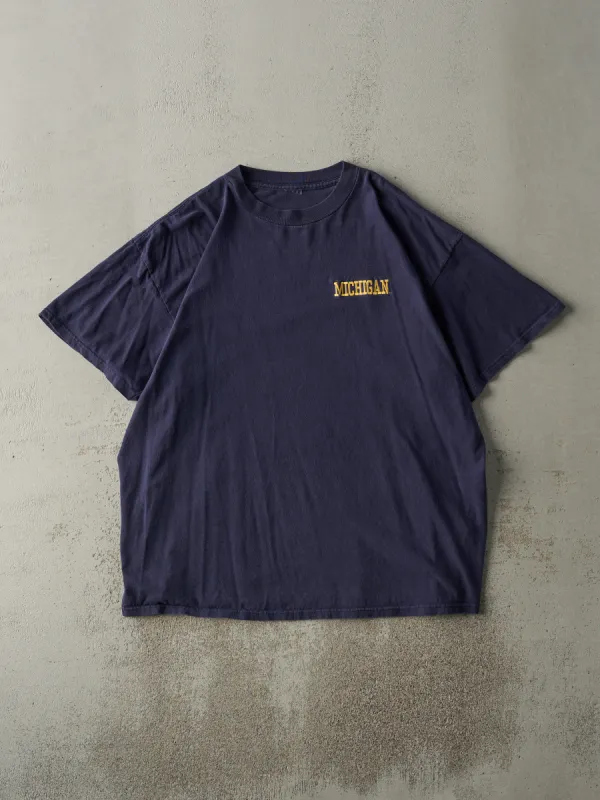Vintage 90s Navy Blue Embroidered University of Michigan Tee (L) sold by Rebalance Vintage