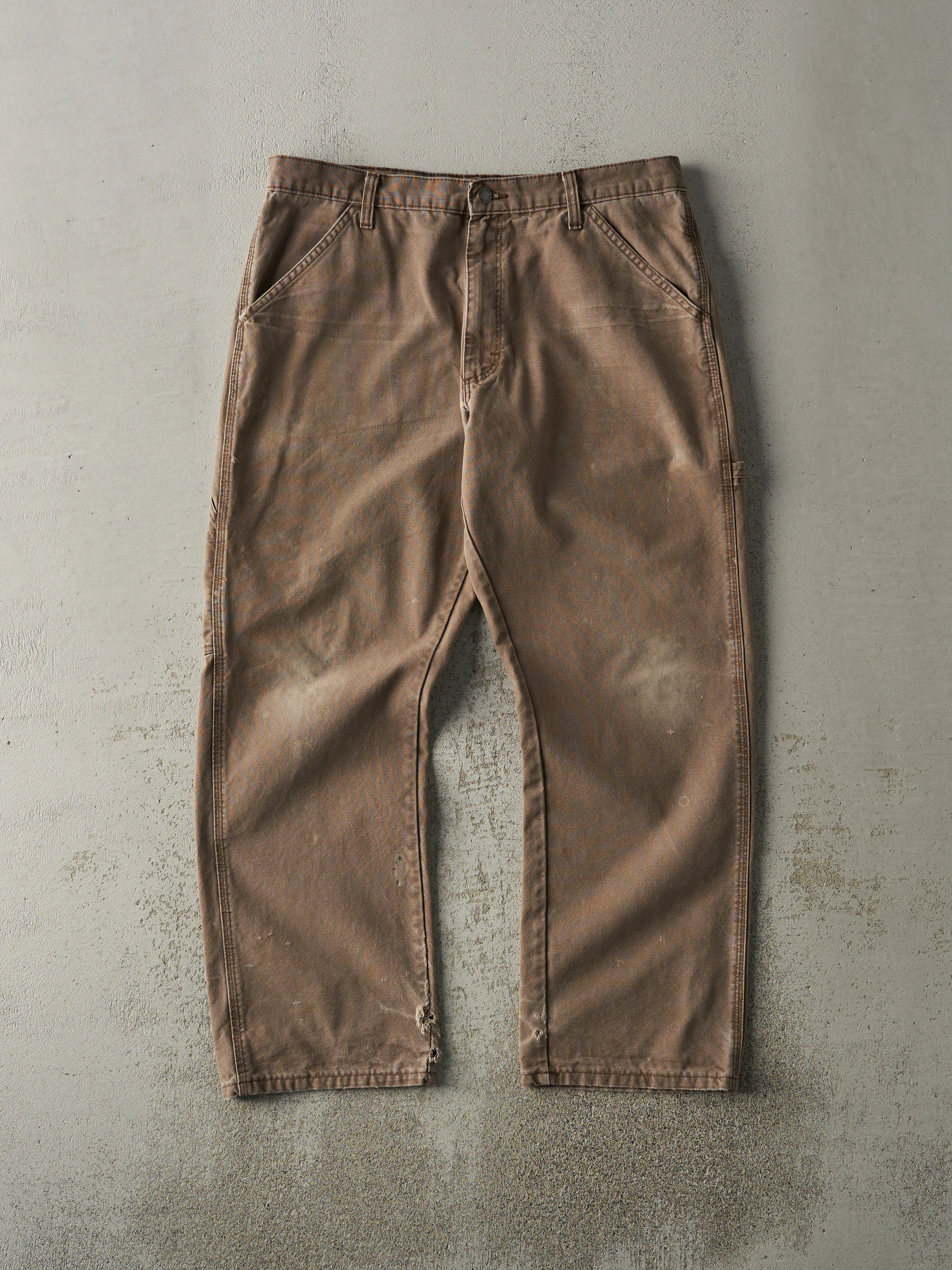 Vintage 90s Brown Rustler Carpenter Pants (35x29) sold by Rebalance Vintage