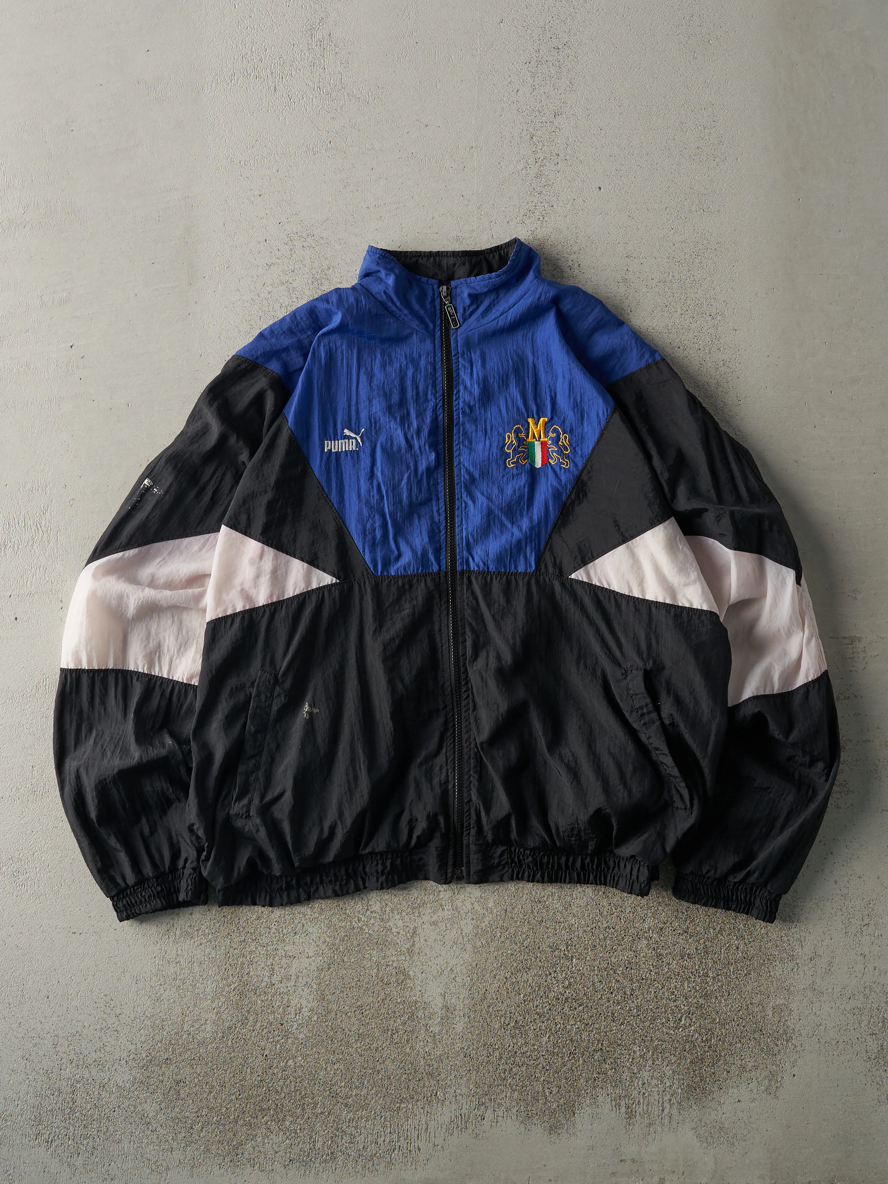 Vintage 90s Blue, Black & White Embroidered Puma Track Jacket (L) sold by Rebalance Vintage