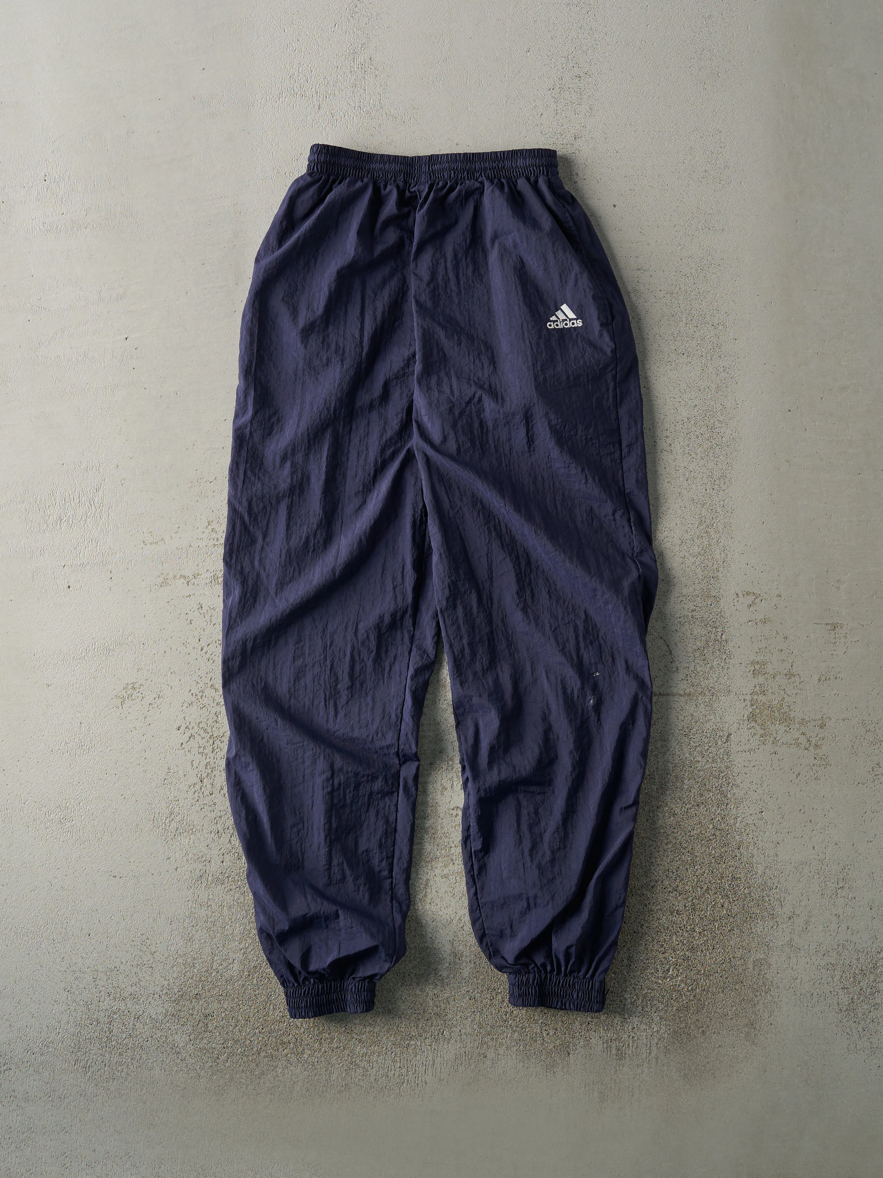 Vintage 90s Navy Blue Embroidered Logo Adidas Track Pants (25x29.5) sold by Rebalance Vintage