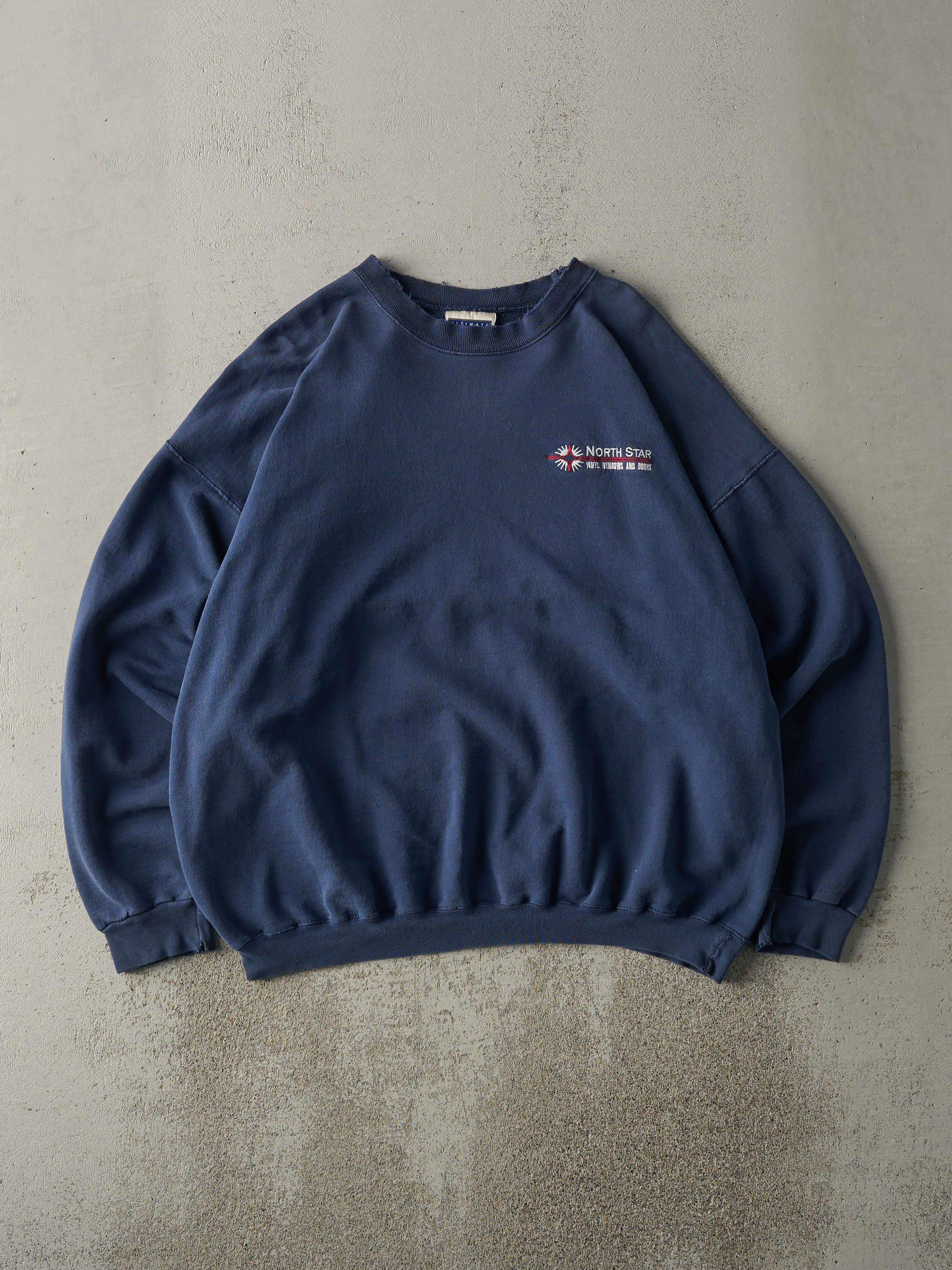 Vintage 90s Navy Blue Embroidered North Star Crewneck (XL) sold by Rebalance Vintage