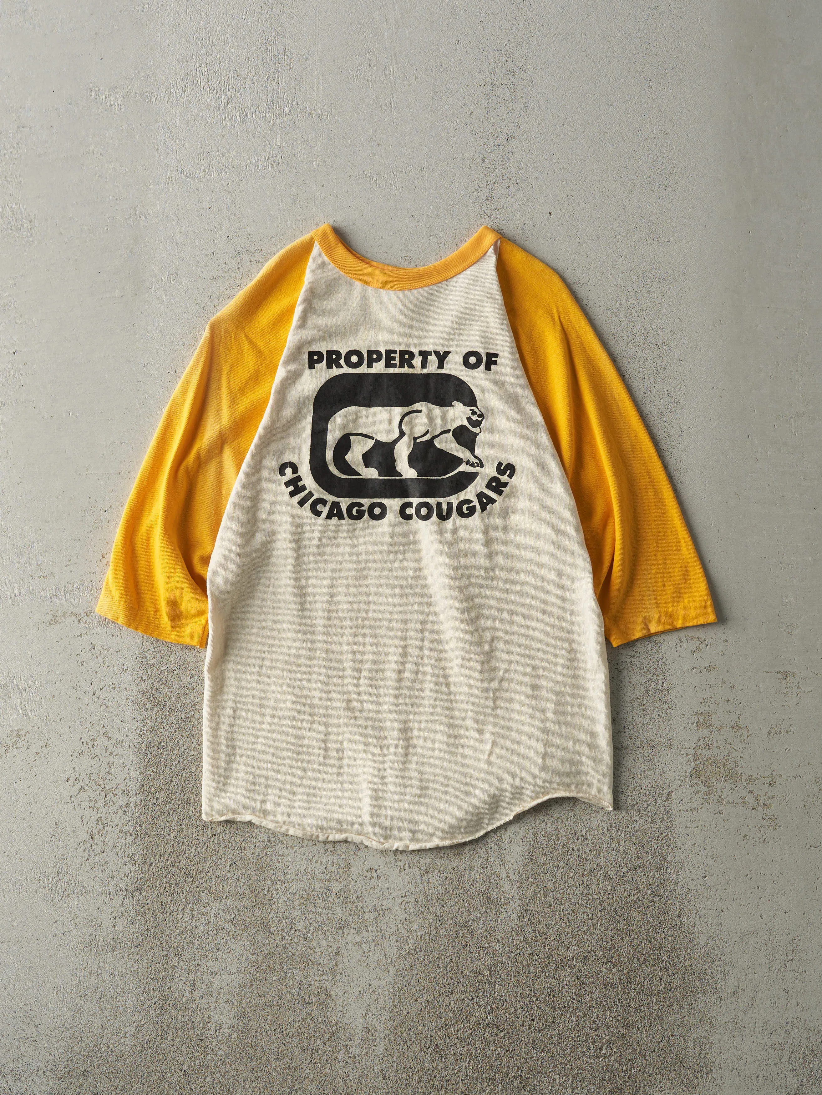 Vintage 70s Yellow & Beige Chicago Cougars Russell 3/4 Sleeve Shirt (XS/S) sold by Rebalance Vintage