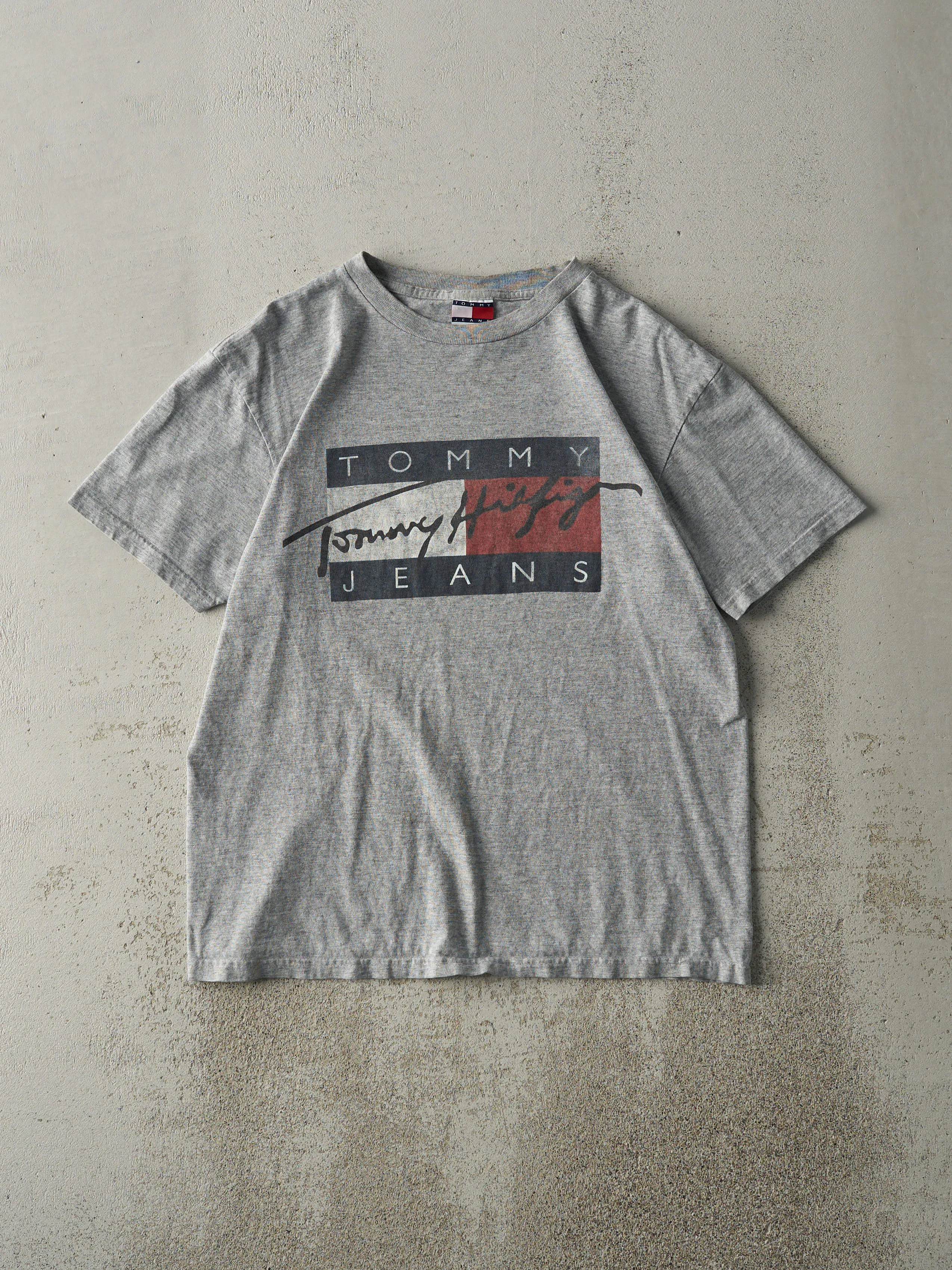 Vintage 90s Grey Tommy Jeans Logo Tee (M) sold by Rebalance Vintage