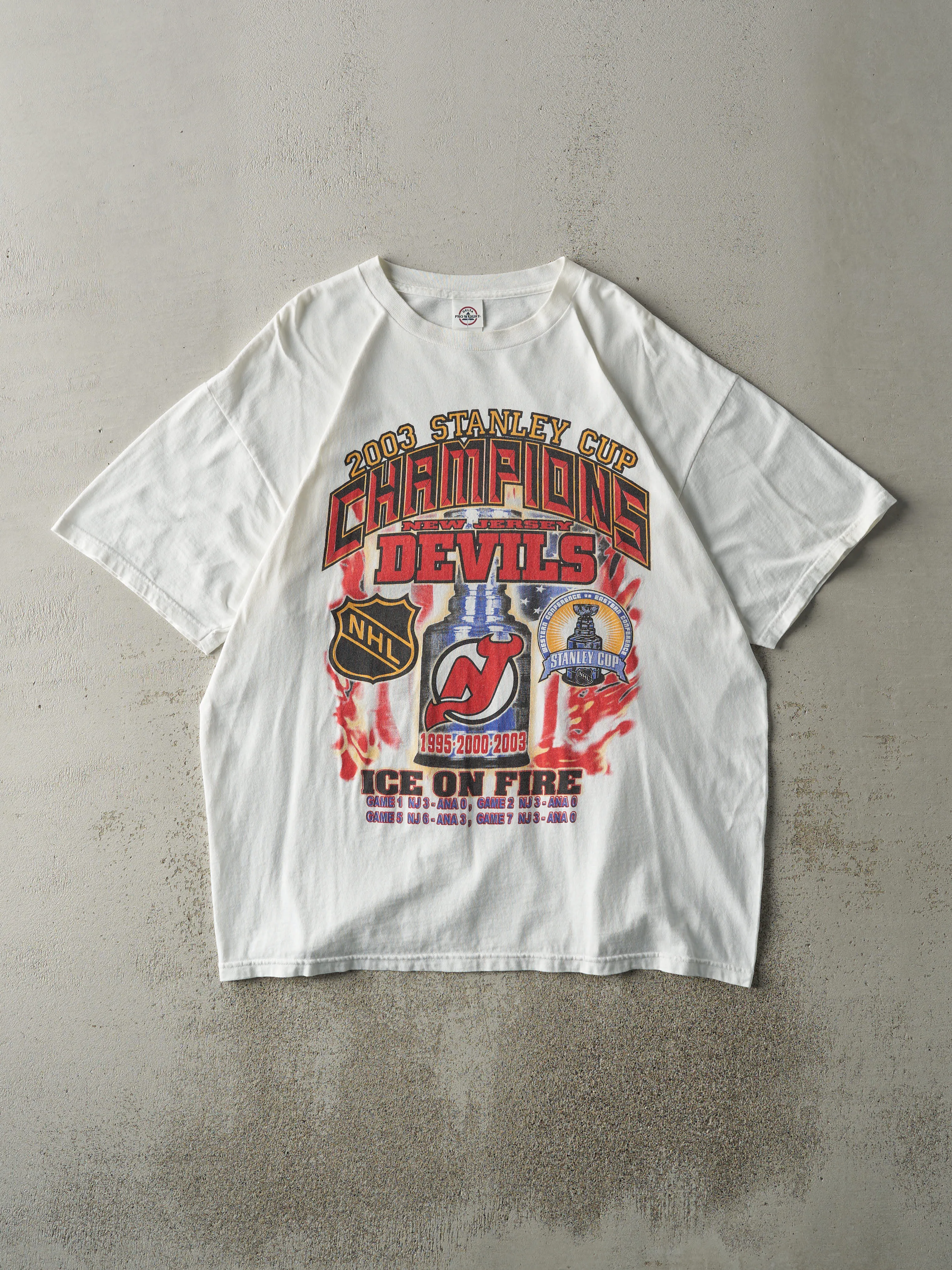 Vintage 03' White New Jersey Devils Stanley Cup Champions Tee (L) sold by Rebalance Vintage