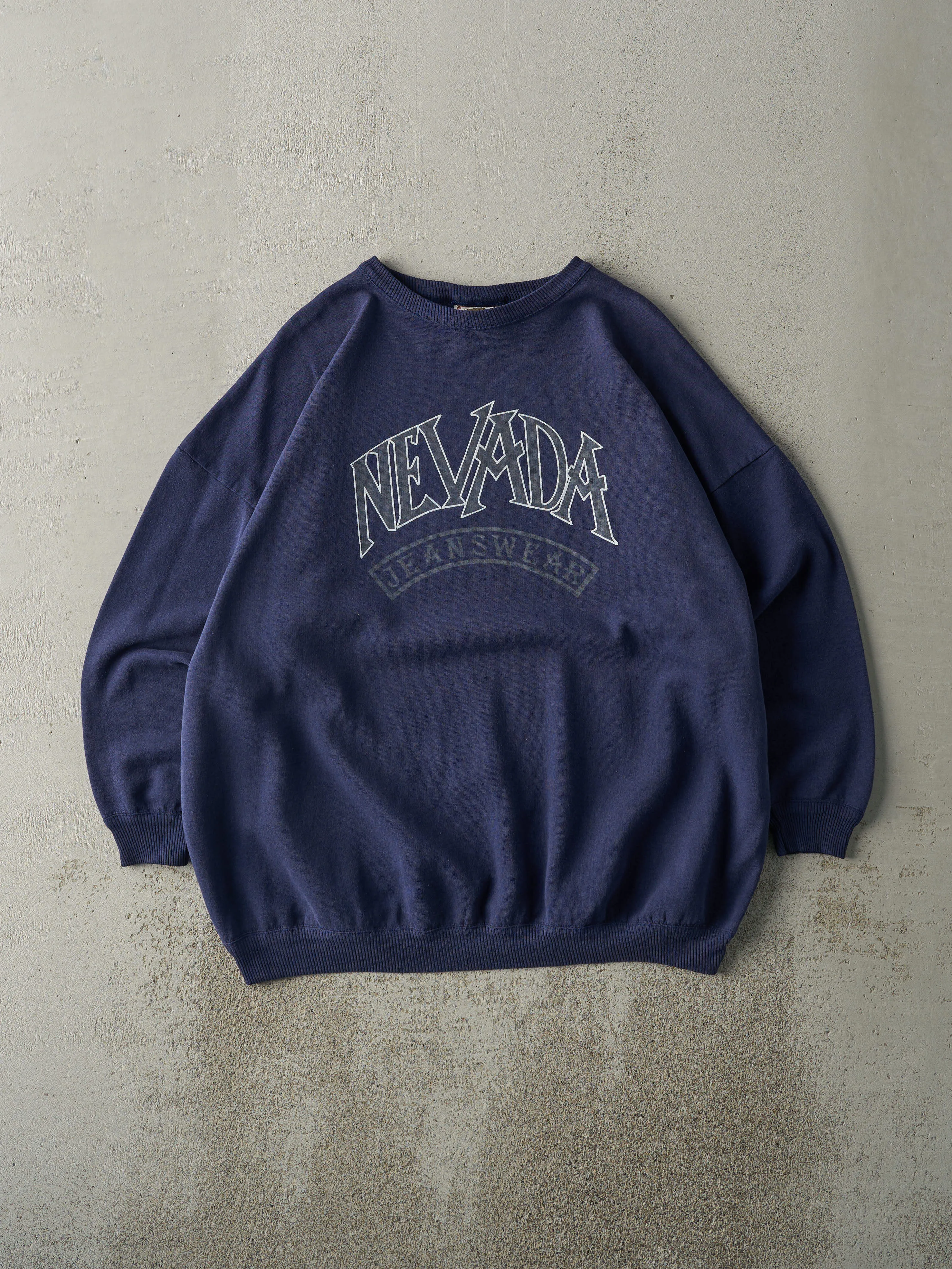 Vintage 90s Navy Blue Nevada Jeans Wear Crewneck (XL) sold by Rebalance Vintage