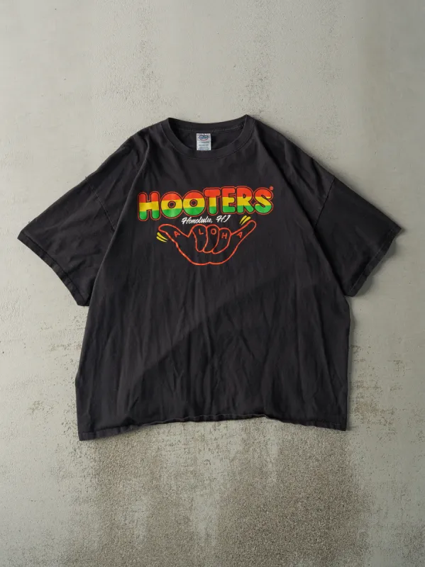 Vintage Y2K Black Hooters Honolulu Tee (L) sold by Rebalance Vintage