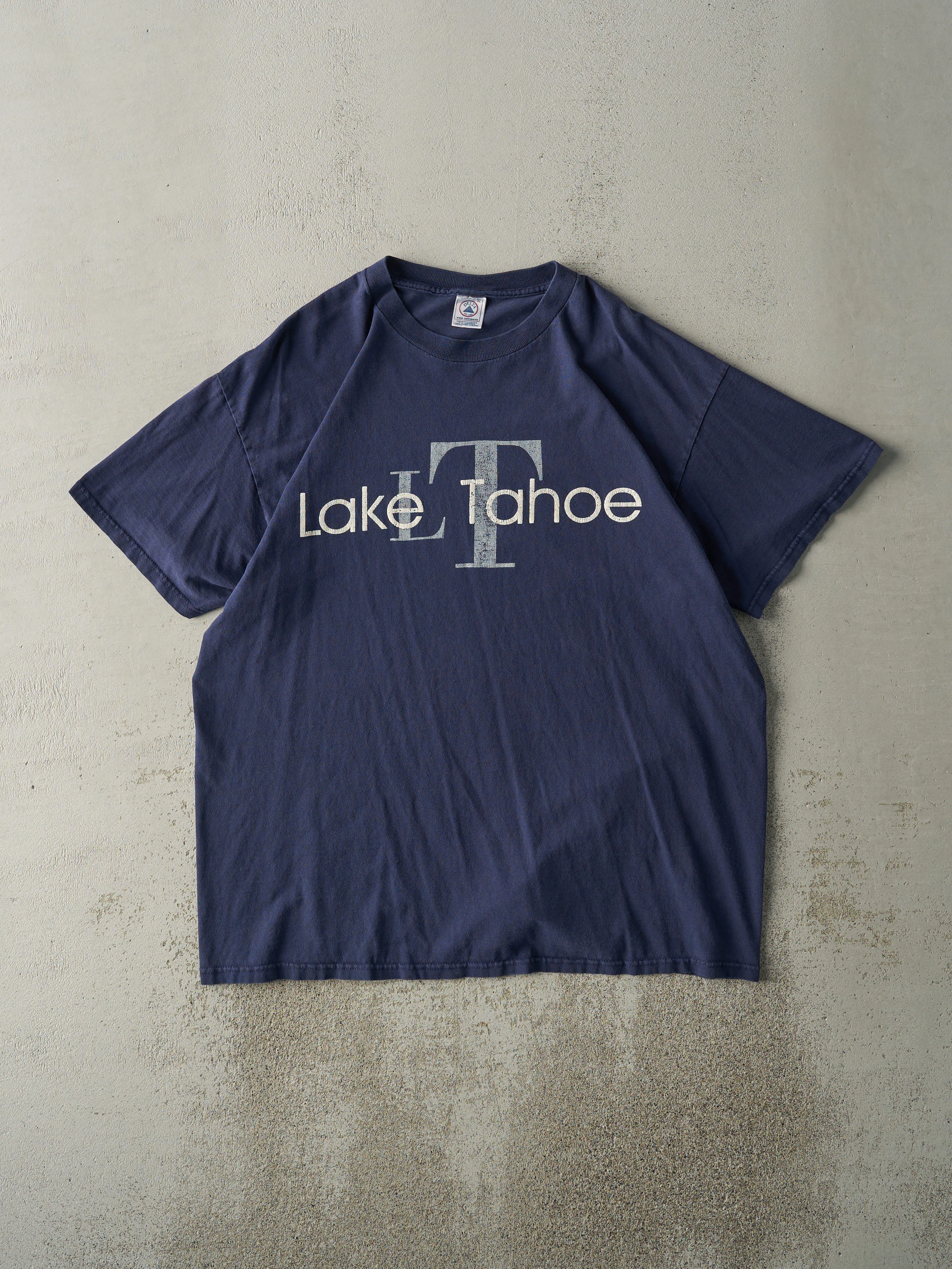 Vintage 90s Navy Blue Lake Tahoe Tee (L) sold by Rebalance Vintage