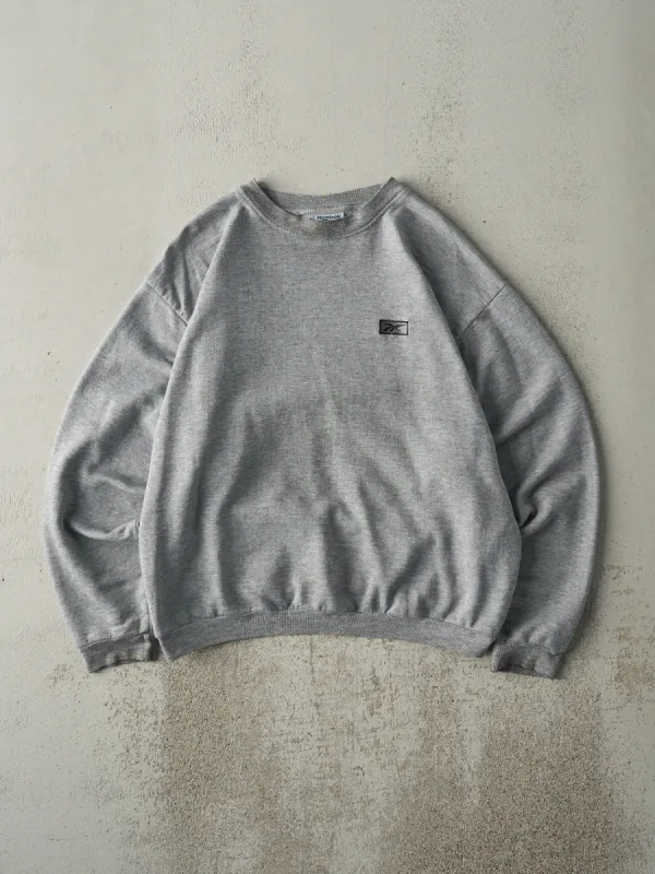 Vintage Y2K Grey Embroidered Reebok Logo Crewneck (L) sold by Rebalance Vintage