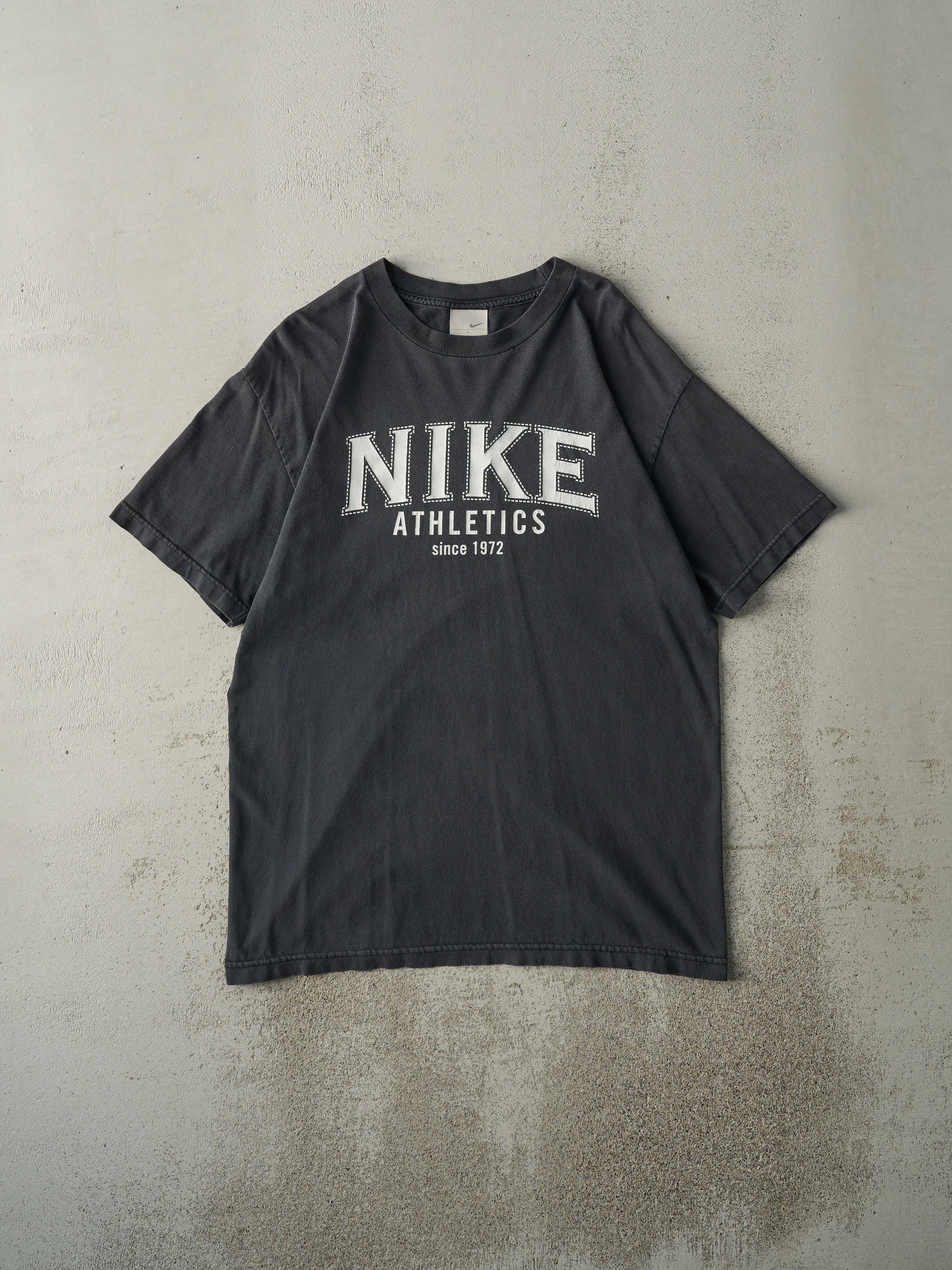 Vintage Y2K Faded Black Nike Athletics Tee (M) sold by Rebalance Vintage
