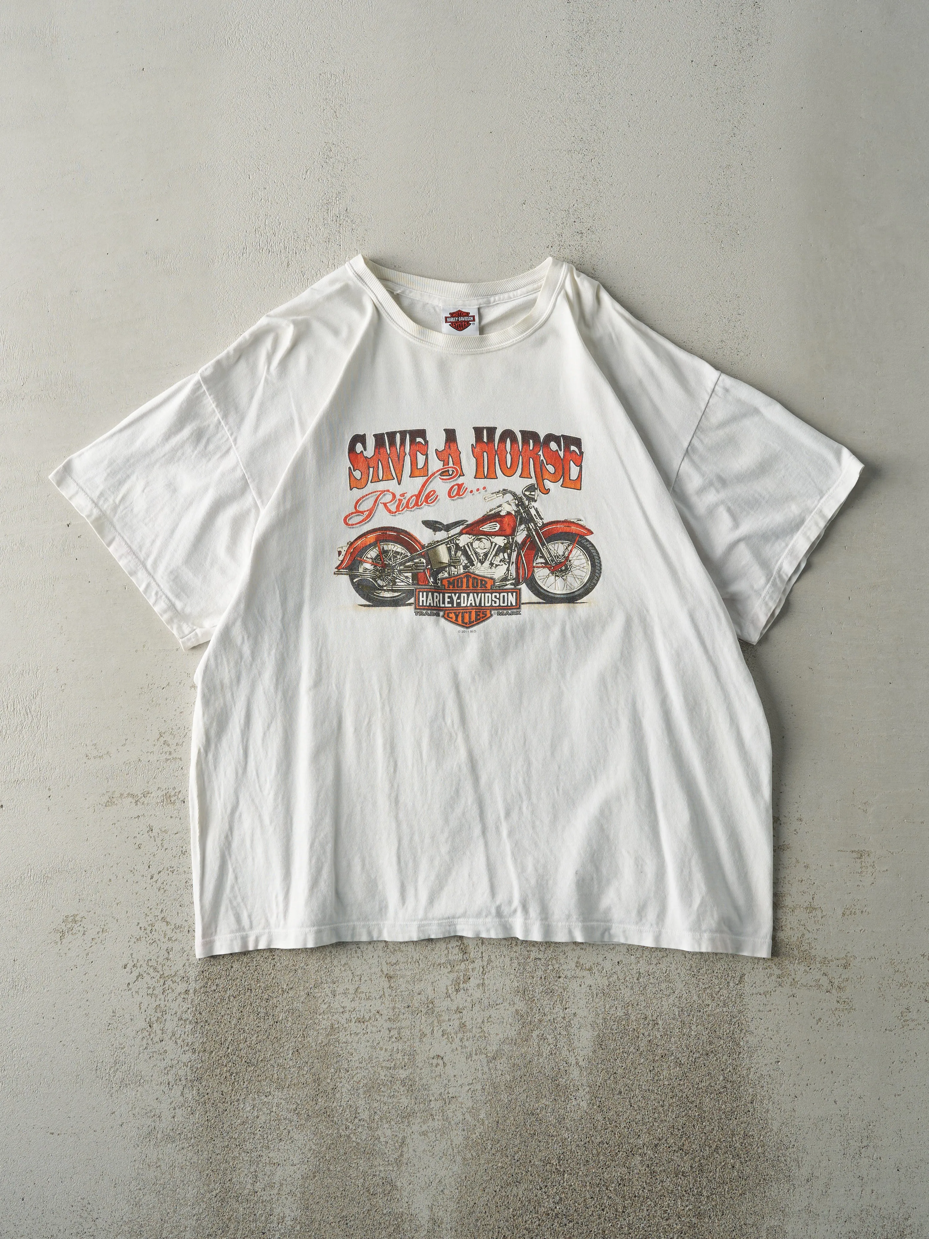 Vintage 11' White Calgary Alberta Harley Davidson "Save A Horse.." Tee (L/XL) sold by Rebalance Vintage