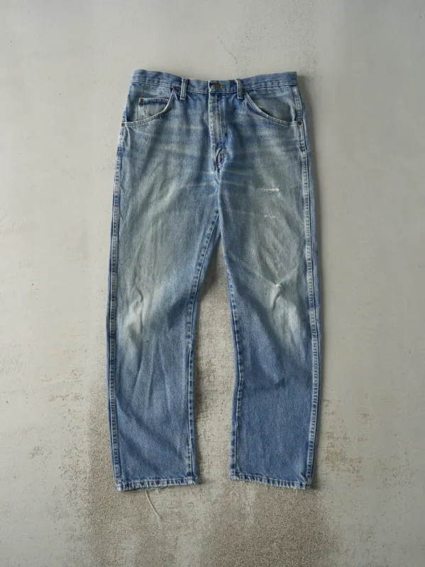 Vintage 90s Light Wash Wrangler Jeans (35x31) sold by Rebalance Vintage