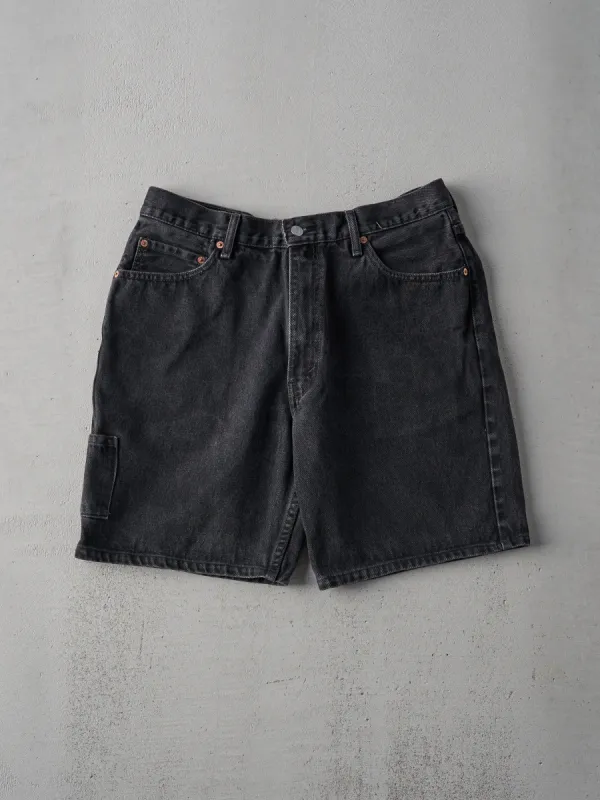 Vintage 90s Black Levi's 550 Shorts (35x8) sold by Rebalance Vintage