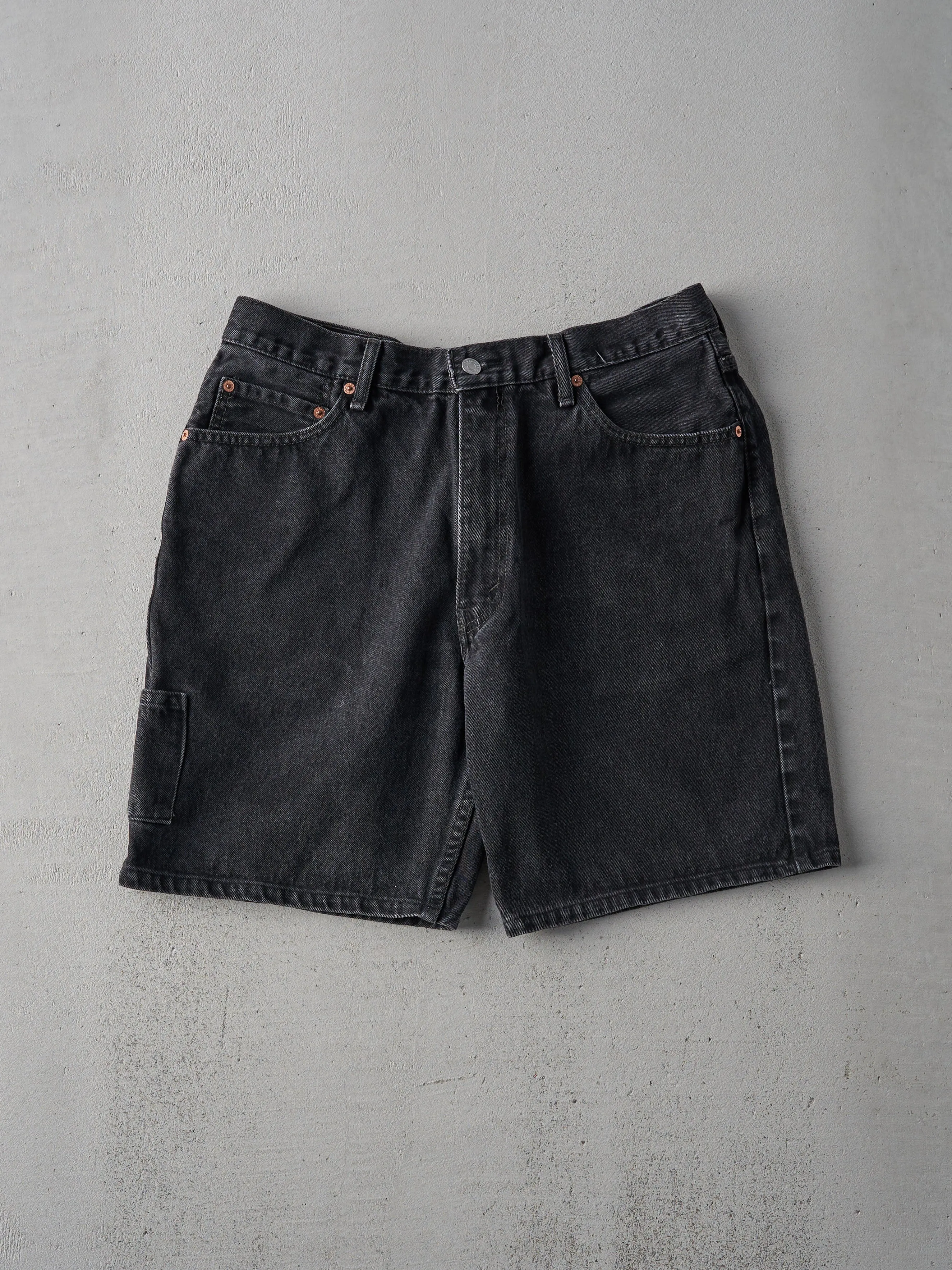 Vintage 90s Black Levi's 550 Shorts (35x8) sold by Rebalance Vintage