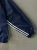 Vintage Y2K Navy Blue Embroidered Adidas Windbreaker (M) sold by Rebalance Vintage