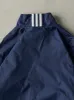 Vintage Y2K Navy Blue Embroidered Adidas Windbreaker (M) sold by Rebalance Vintage