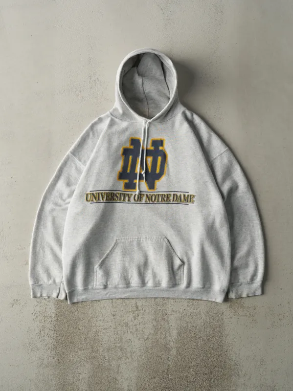 Vintage 90s Heather Grey University of Notre Dame Hoodie (L) sold by Rebalance Vintage