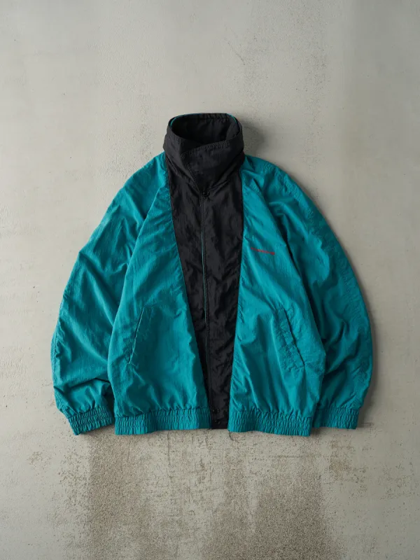 Vintage 90s Teal & Black Porsche Nylon Jacket (M/L) sold by Rebalance Vintage