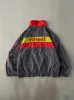 Vintage 90s Grey, Red & Yellow Shell Racing Jacket (XXL) sold by Rebalance Vintage