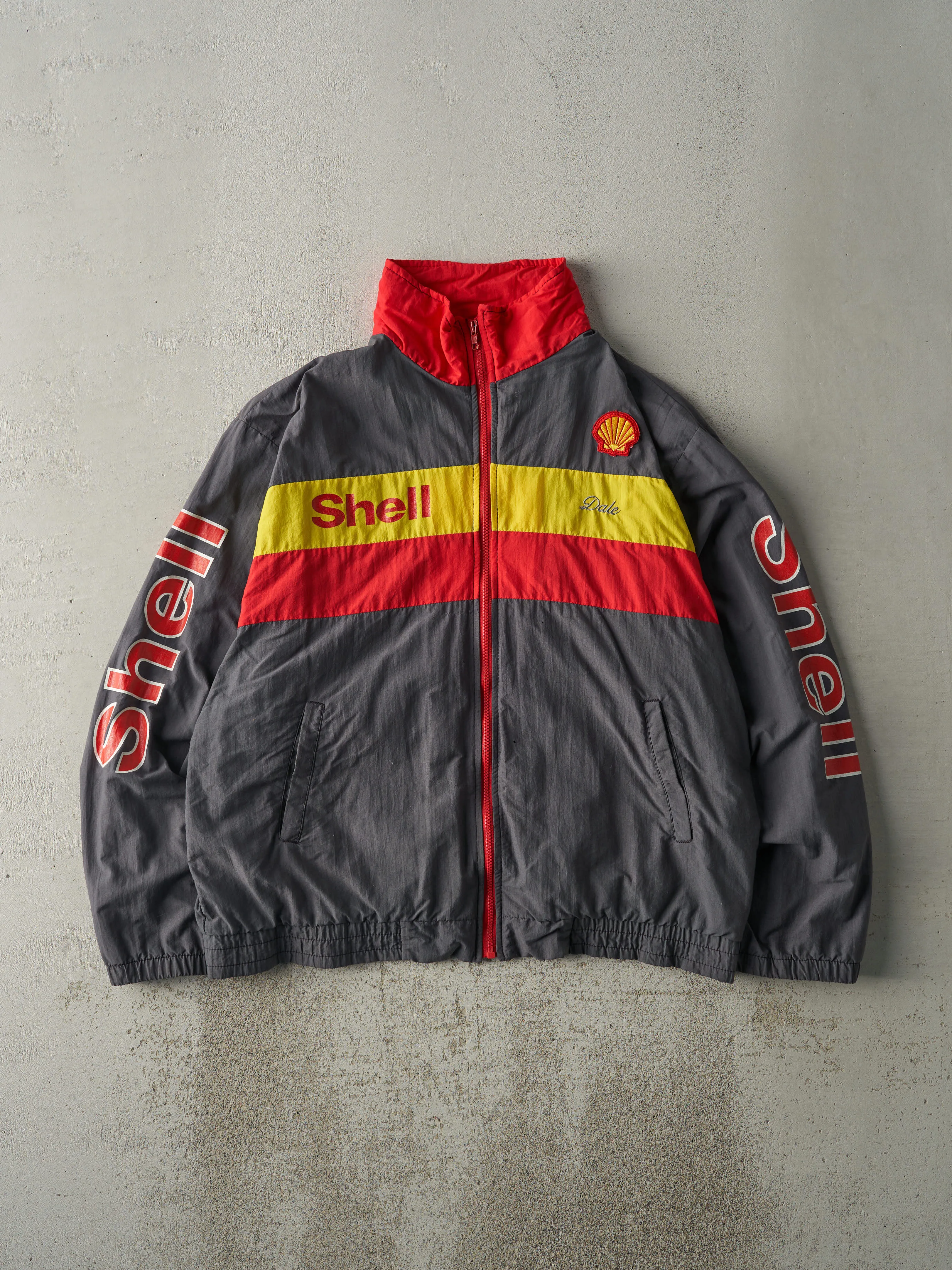 Vintage 90s Grey, Red & Yellow Shell Racing Jacket (XXL) sold by Rebalance Vintage