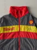 Vintage 90s Grey, Red & Yellow Shell Racing Jacket (XXL) sold by Rebalance Vintage