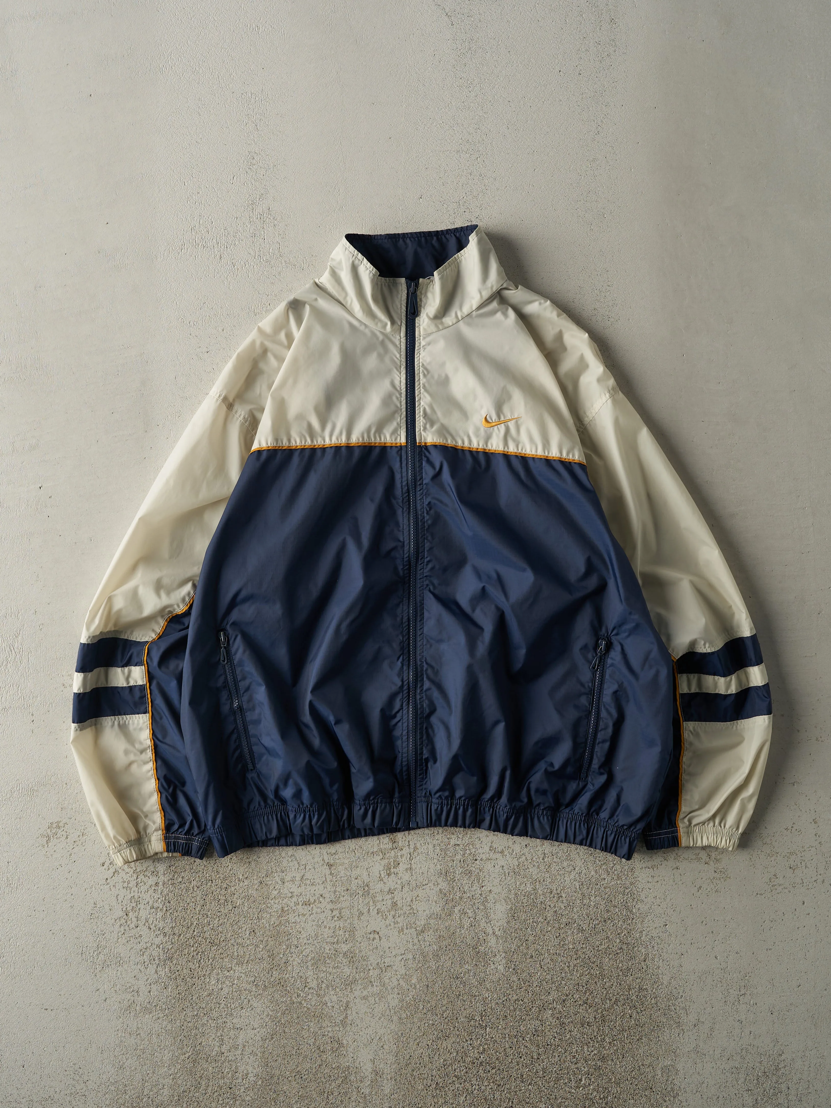 Vintage 90s Navy Blue & Beige Nike Windbreaker Jacket (XL) sold by Rebalance Vintage