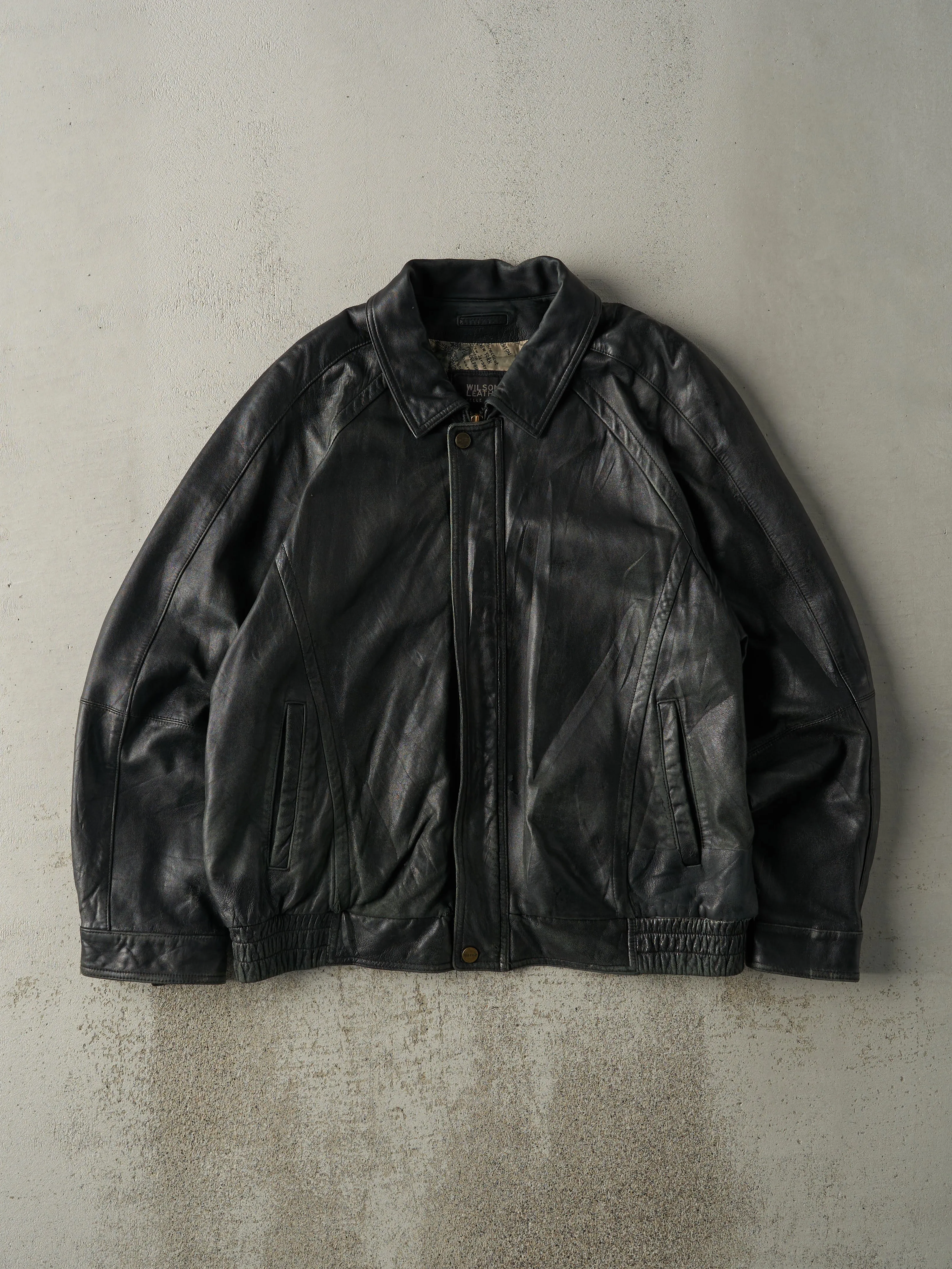 Vintage 90s Black Wilson's Leather Jacket (XL) sold by Rebalance Vintage