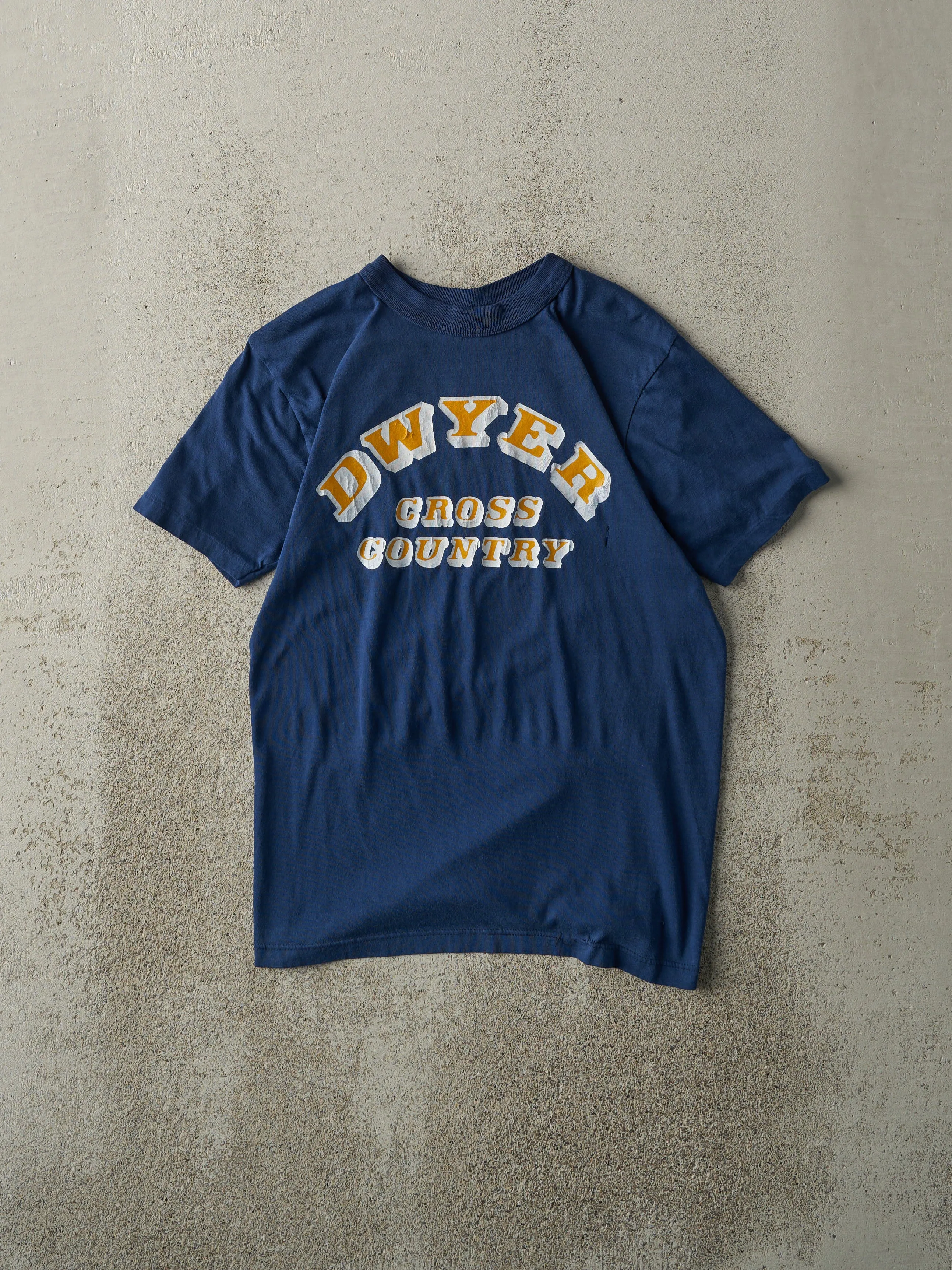 Vintage 80s Navy Blue Dwyer Cross Country Tee (XS) sold by Rebalance Vintage