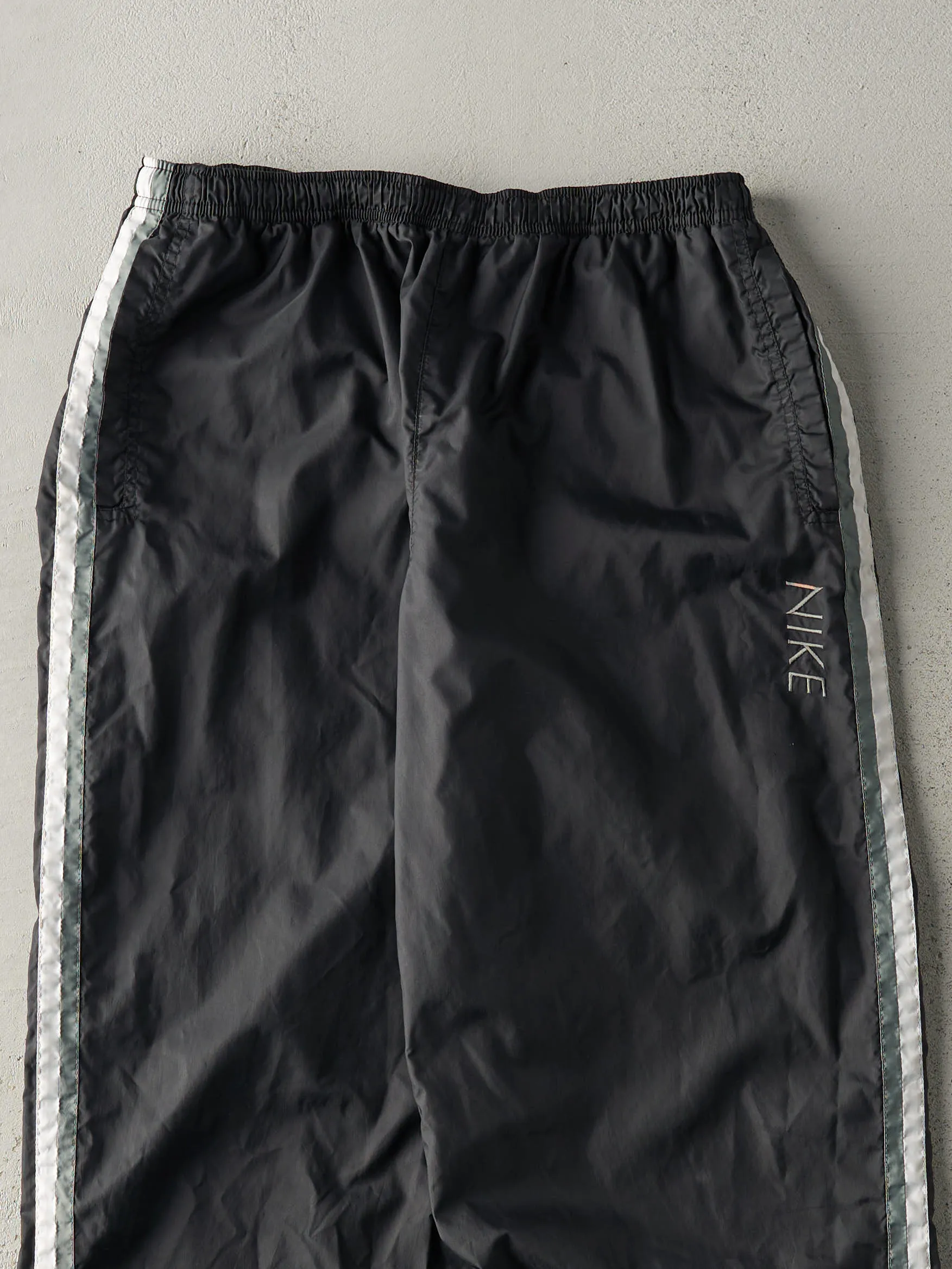 Vintage Y2K Black & Green Nike Embroidered Windbreaker Pants (31x31) sold by Rebalance Vintage product image thumbnail 4