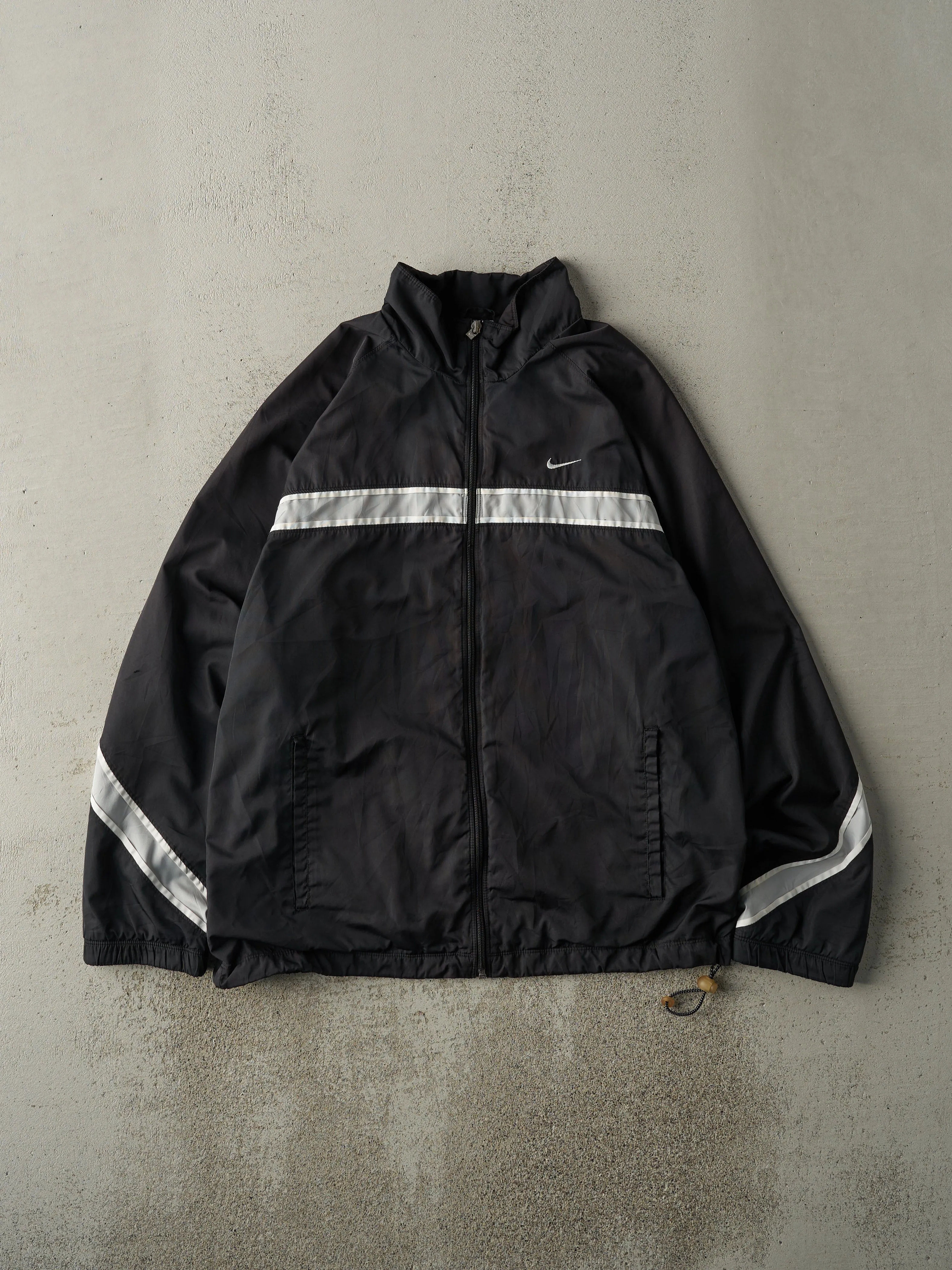 Vintage Y2K Black Reflective Nike Track Jacket (M/L) sold by Rebalance Vintage