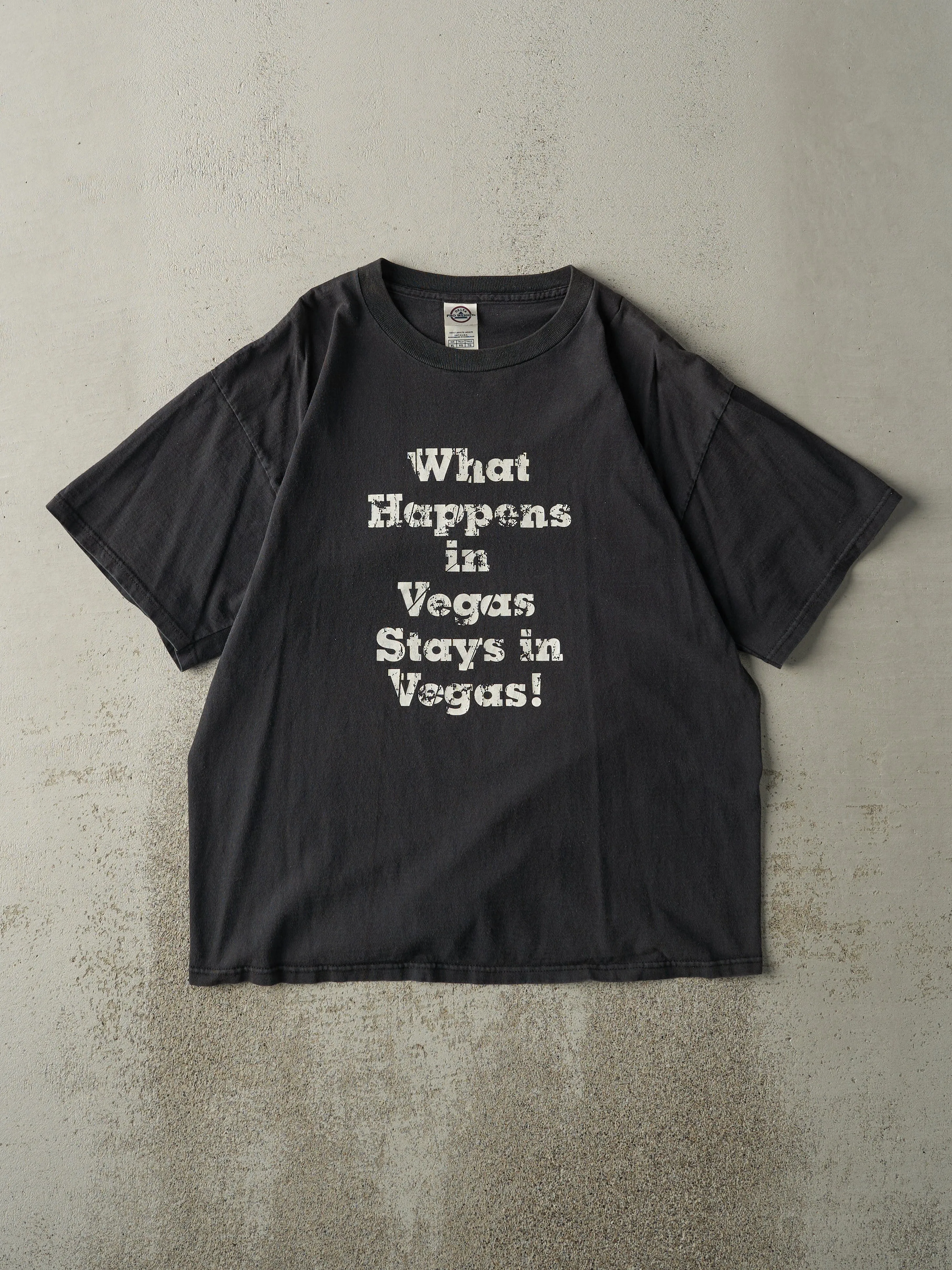 Vintage Y2K Black "What Happens in Vegas" Tee (L) sold by Rebalance Vintage