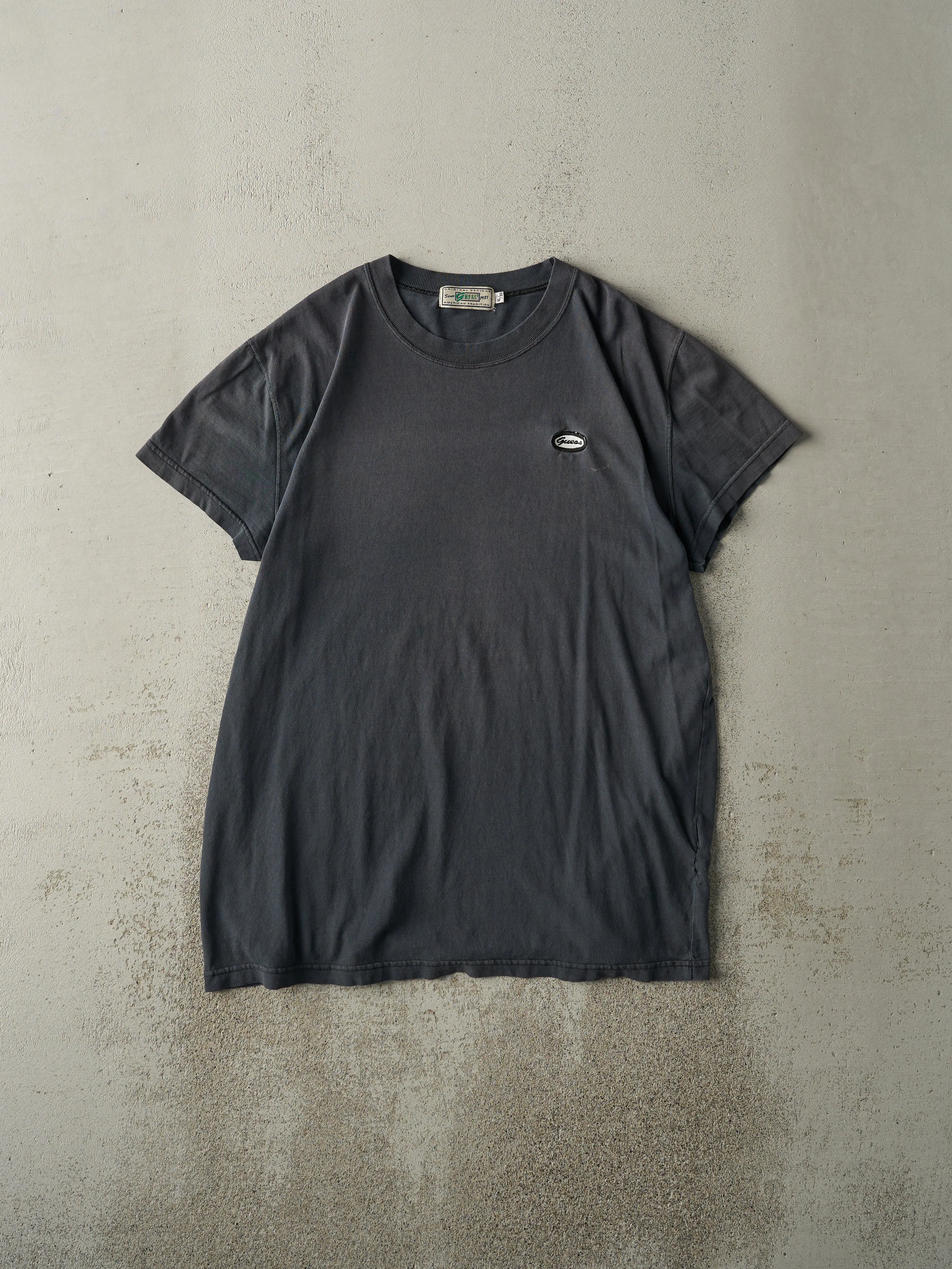 Vintage 90s Faded Black Embroidered Guess Tee (L/XL) sold by Rebalance Vintage