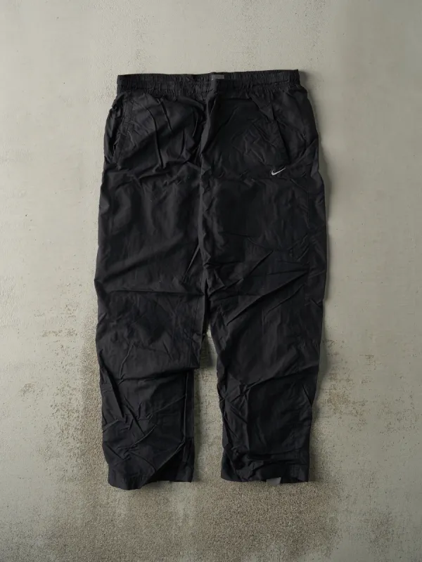 Vintage Y2K Black Nike Embroidered Windbreaker Pants (37x31) sold by Rebalance Vintage