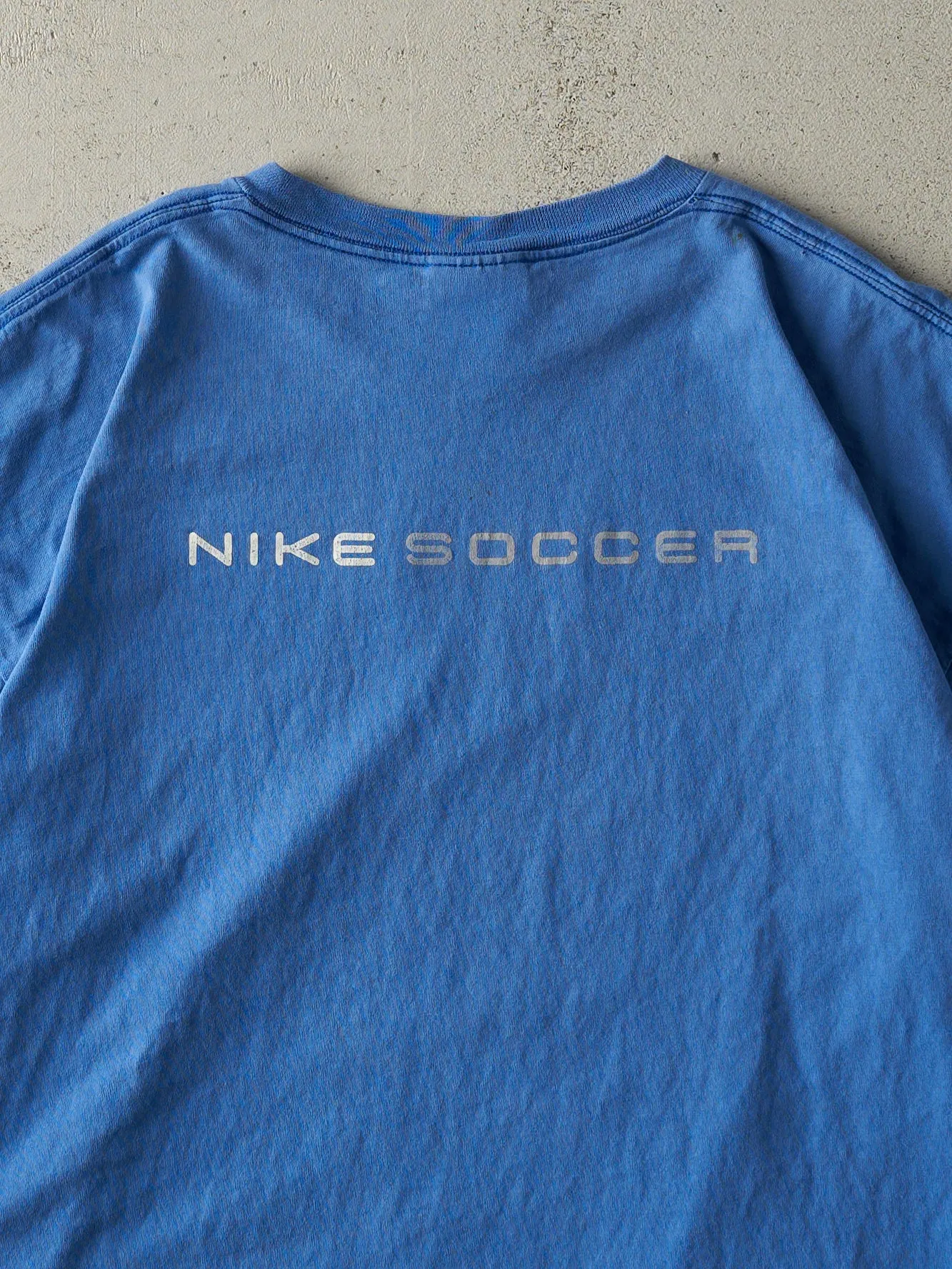 Vintage 90s Blue Nike Soccer Tee (L) sold by Rebalance Vintage product image thumbnail 4