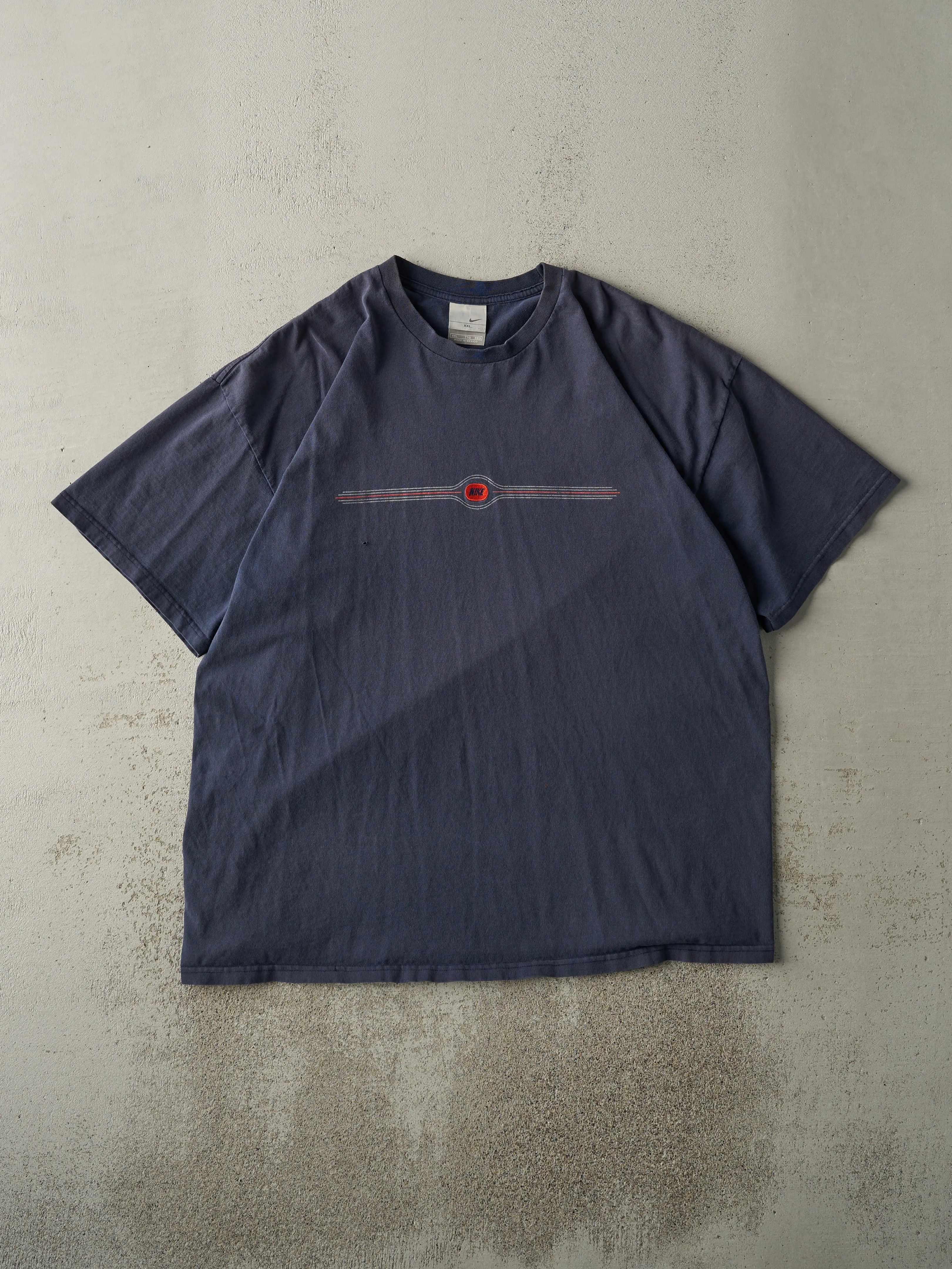 Vintage Y2K Navy Blue Embroidered Nike Tee (XL) sold by Rebalance Vintage