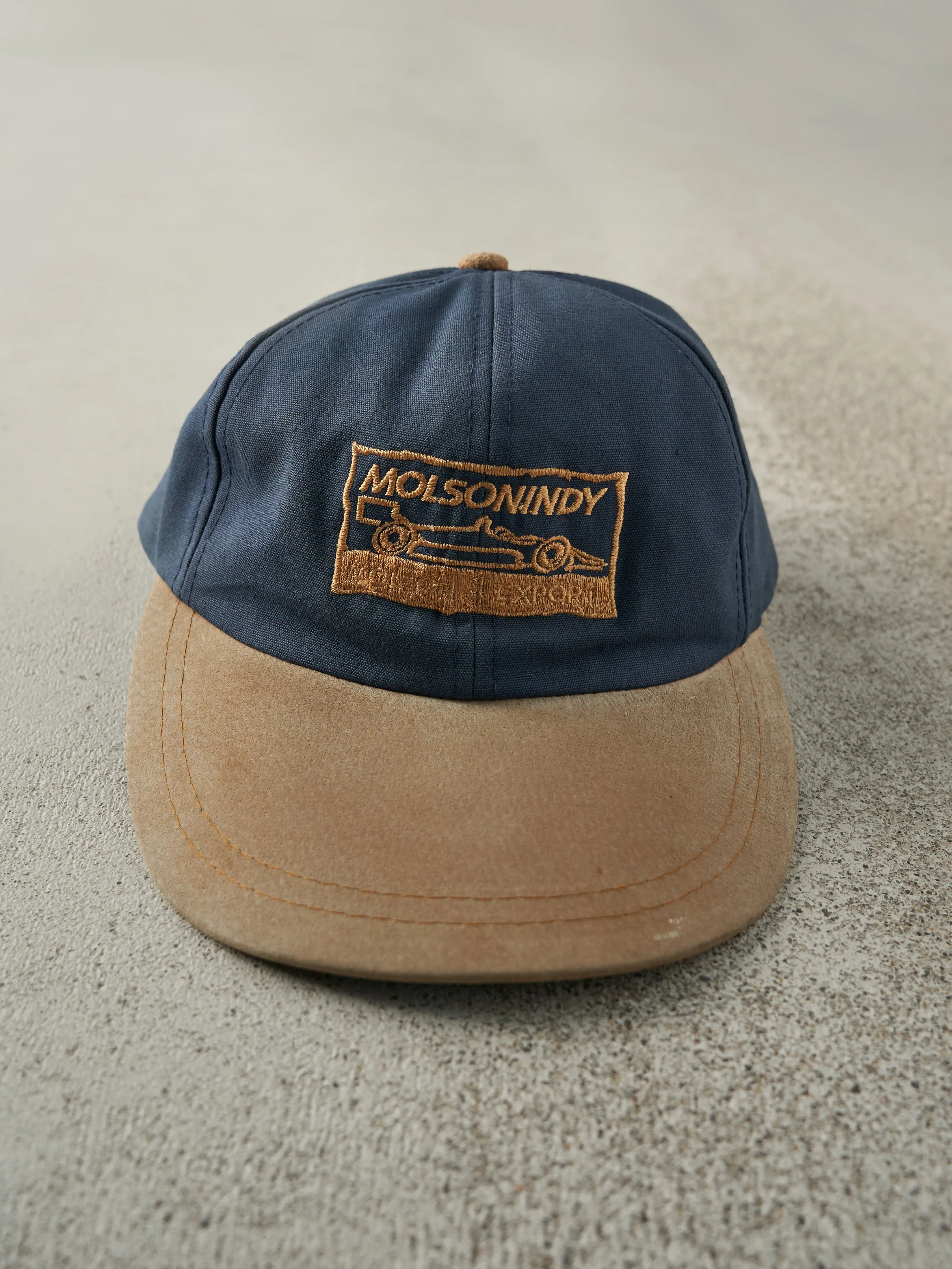 Vintage 90s Blue & Tan Molson Indy Two Tone Leather Strap Back Hat sold by Rebalance Vintage