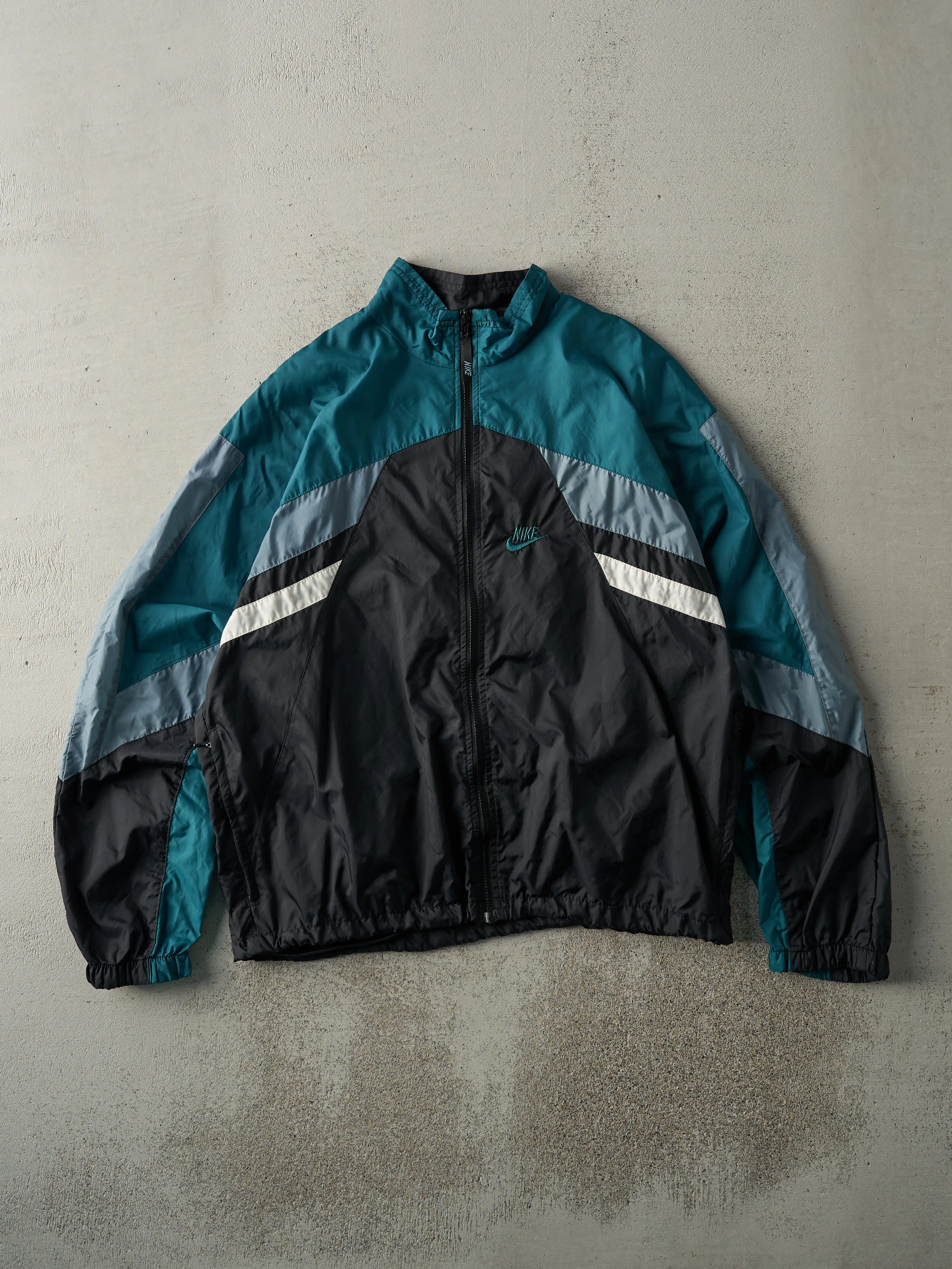 Vintage 90s Black & Green Nike Windbreaker Jacket (M) sold by Rebalance Vintage