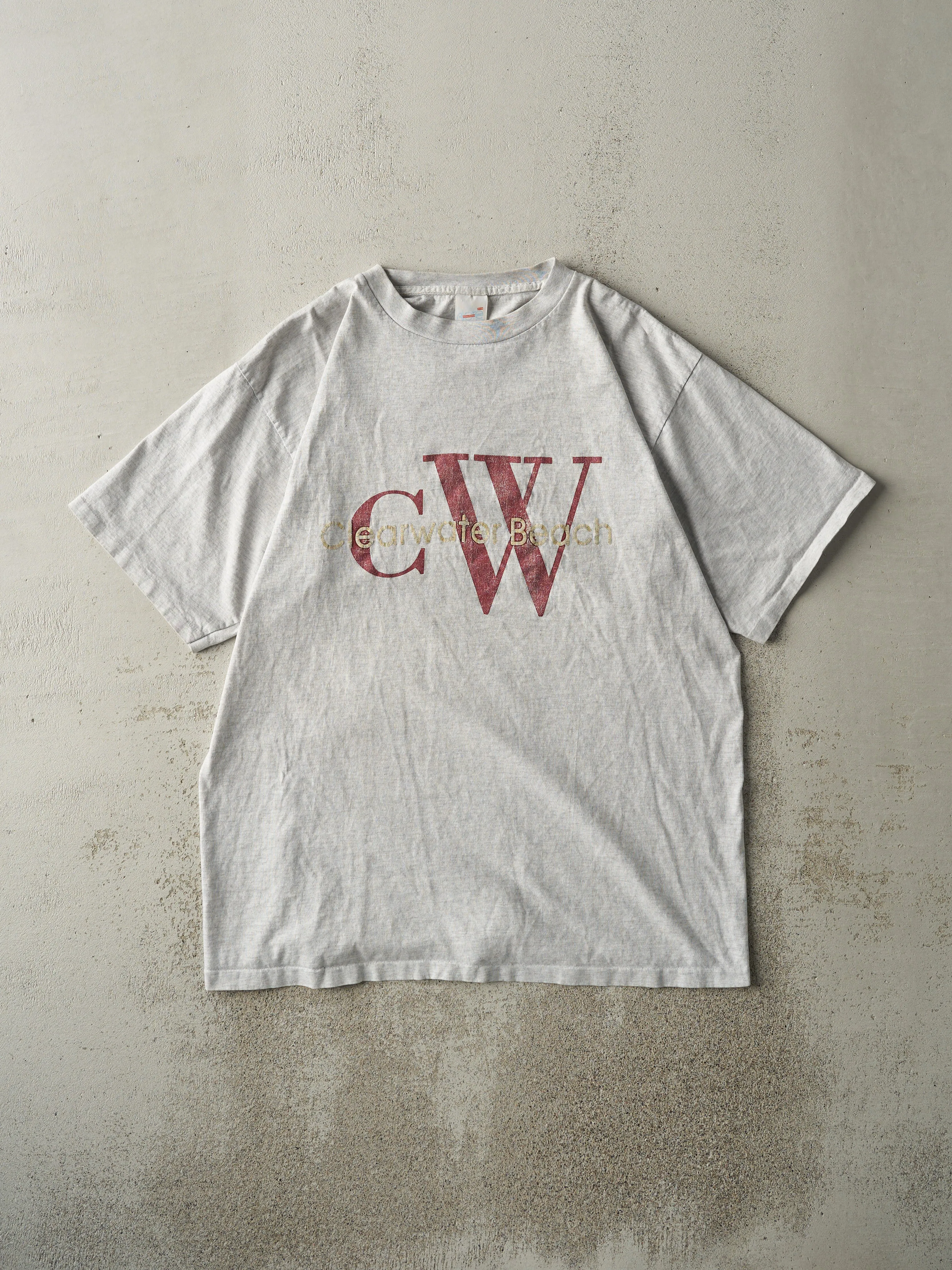 Vintage 90s Heather Grey Clearwater Beach Embroidered Single Stitch Tee (L) sold by Rebalance Vintage