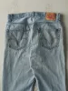 Vintage Y2K Light Wash Levi's Regular Fit Jeans (33x30) sold by Rebalance Vintage