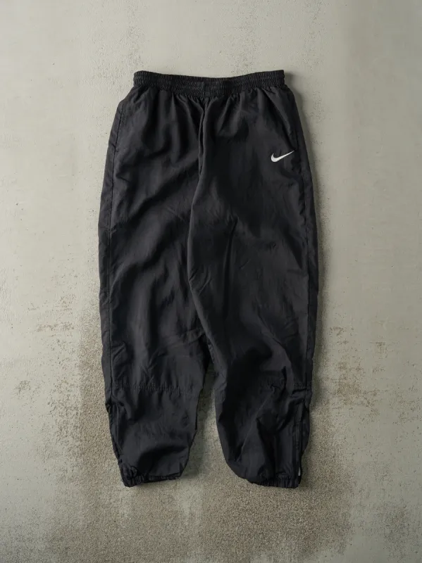 Vintage 90s Black Nike Windbreaker Pants (30x28.5) sold by Rebalance Vintage