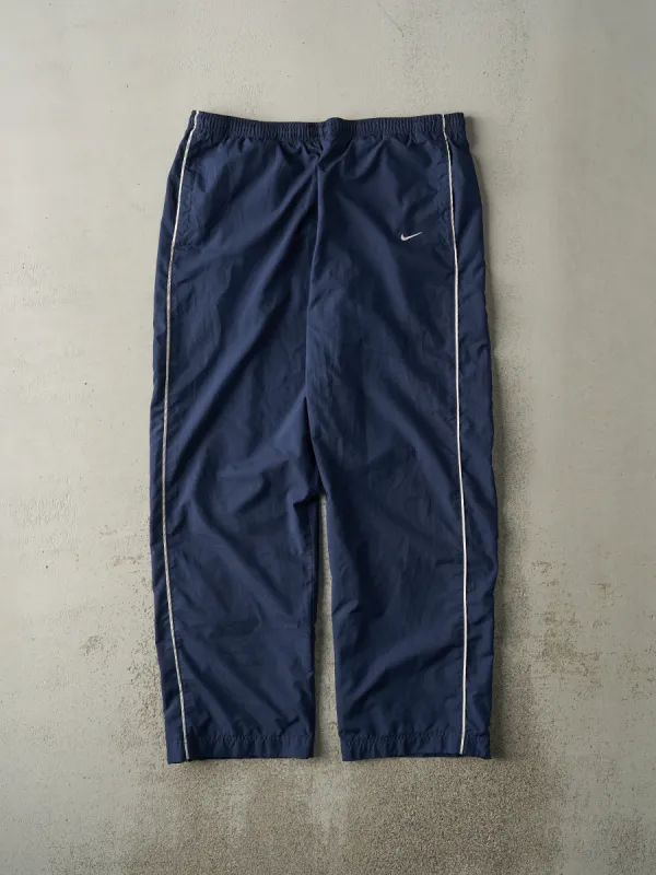 Vintage Y2K Navy Blue Nike Embroidered Windbreaker Pants (38x32.5) sold by Rebalance Vintage