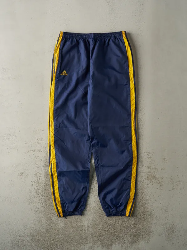Vintage 90s Navy & Yellow Embroidered Adidas Windbreaker Pants (33x31.5) sold by Rebalance Vintage