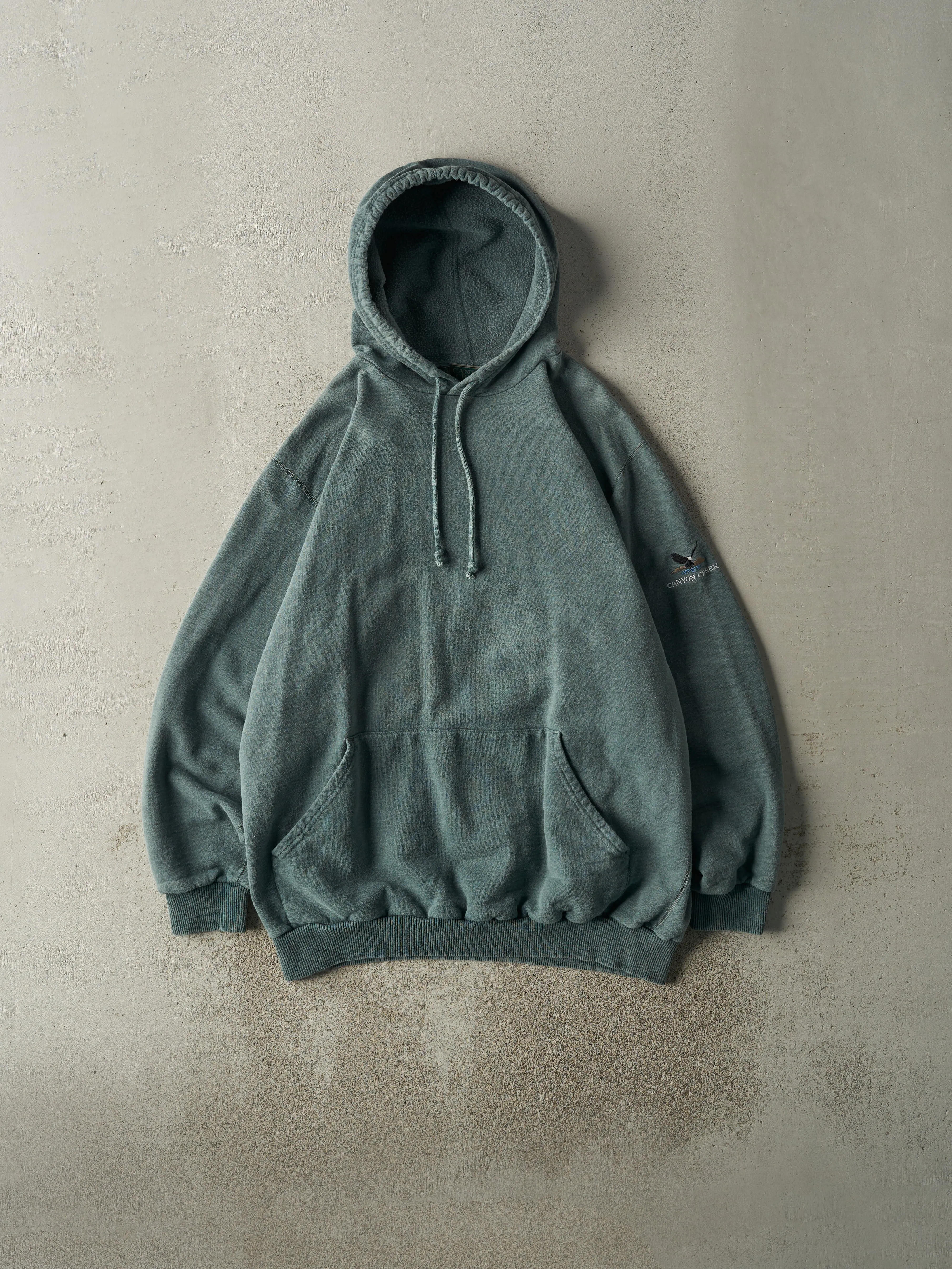 Vintage 90s Washed Green Canyon Creek Blank Hoodie (L/XL) sold by Rebalance Vintage