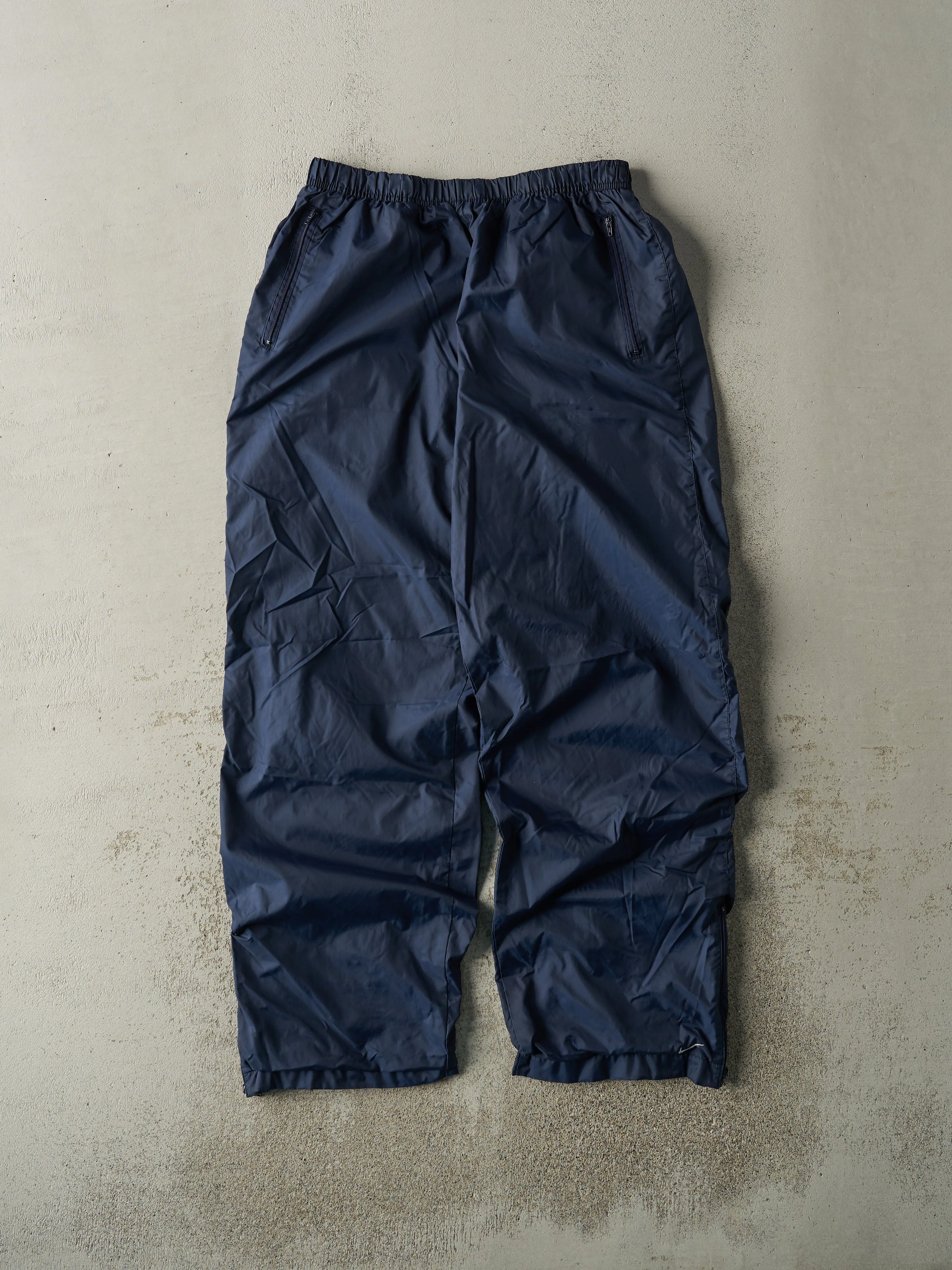 Vintage Y2K Navy Blue Nike Windbreaker Pants (26x29) sold by Rebalance Vintage