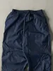 Vintage Y2K Navy Blue Nike Windbreaker Pants (26x29) sold by Rebalance Vintage