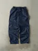 Vintage Y2K Navy Blue Nike Windbreaker Pants (26x29) sold by Rebalance Vintage
