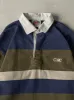 Vintage Y2K Green, Navy & Beige Rugby Shirt (L) sold by Rebalance Vintage