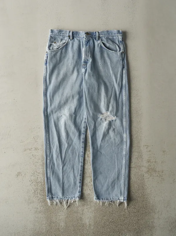 Vintage 90s Light Wash Wrangler Jeans (34x28) sold by Rebalance Vintage